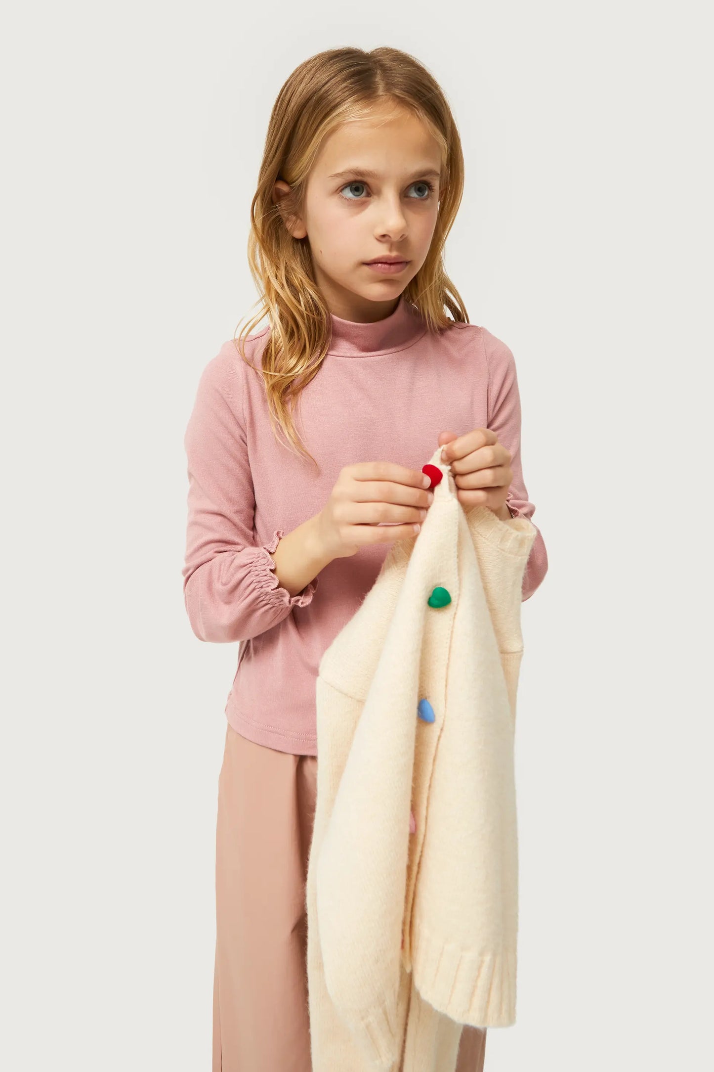 Top de niña cuello alto rosa