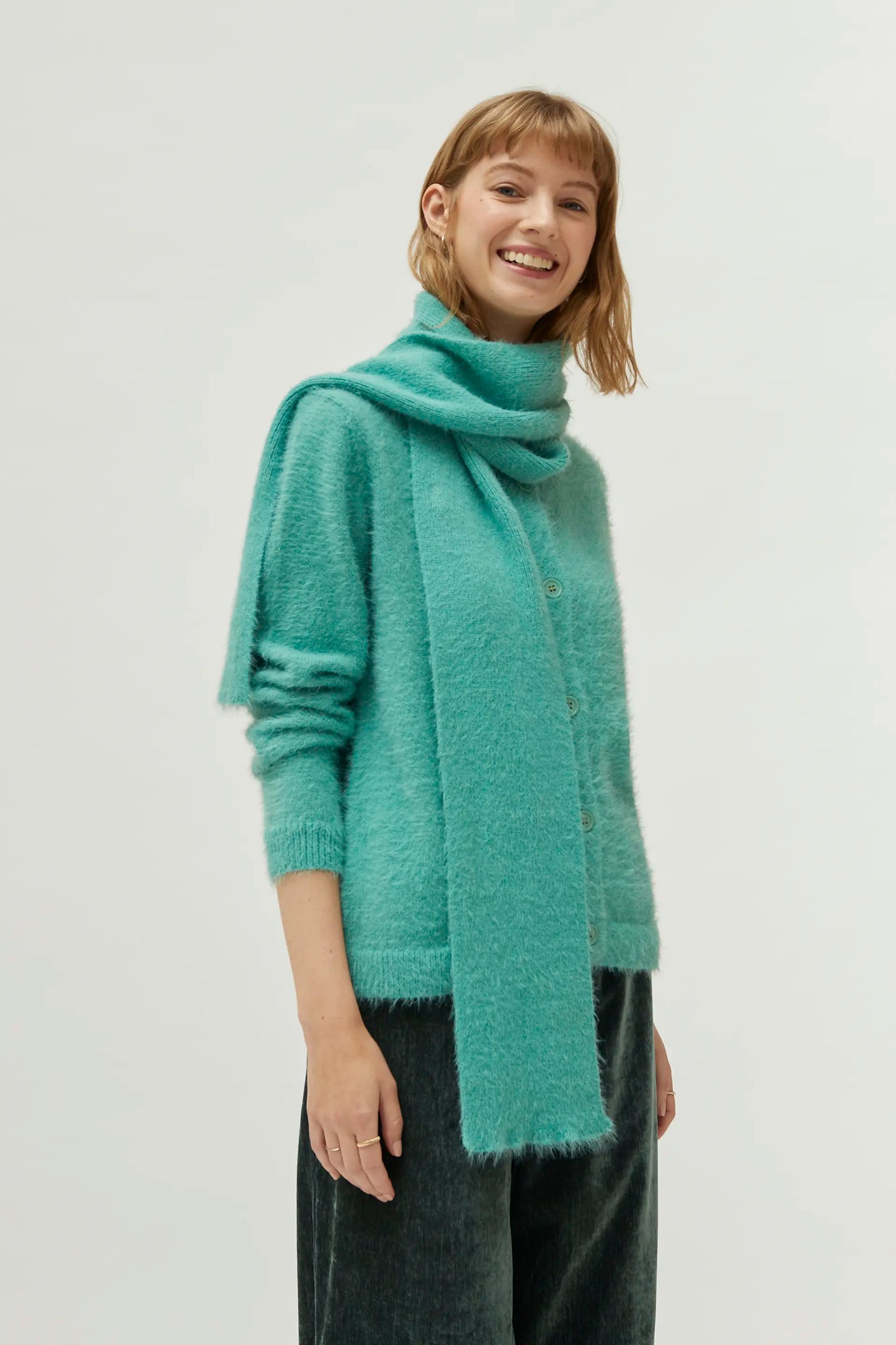 Bufanda de punto con textura turquesa