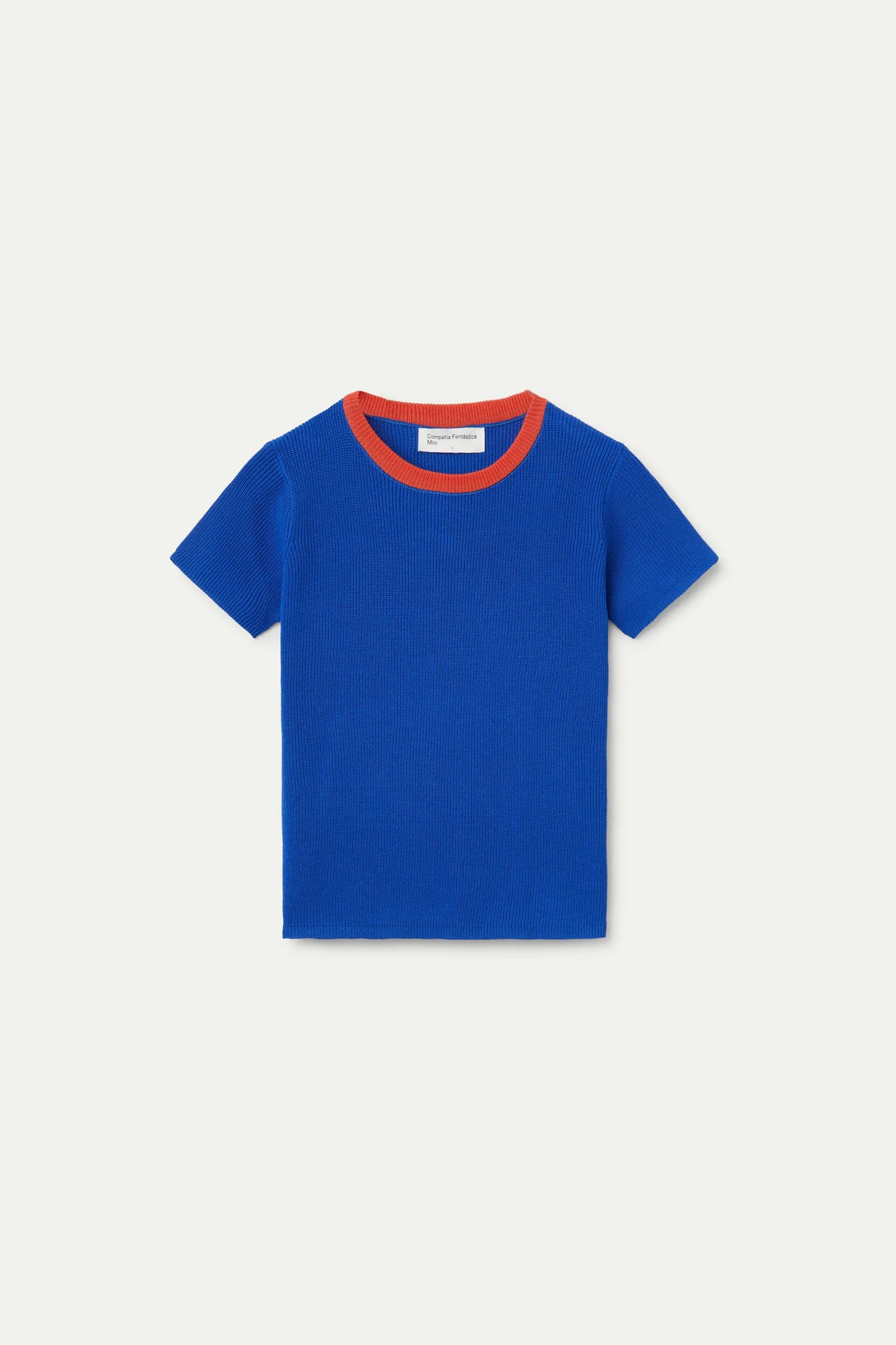 Top blu in maglia a maniche corte per bambina