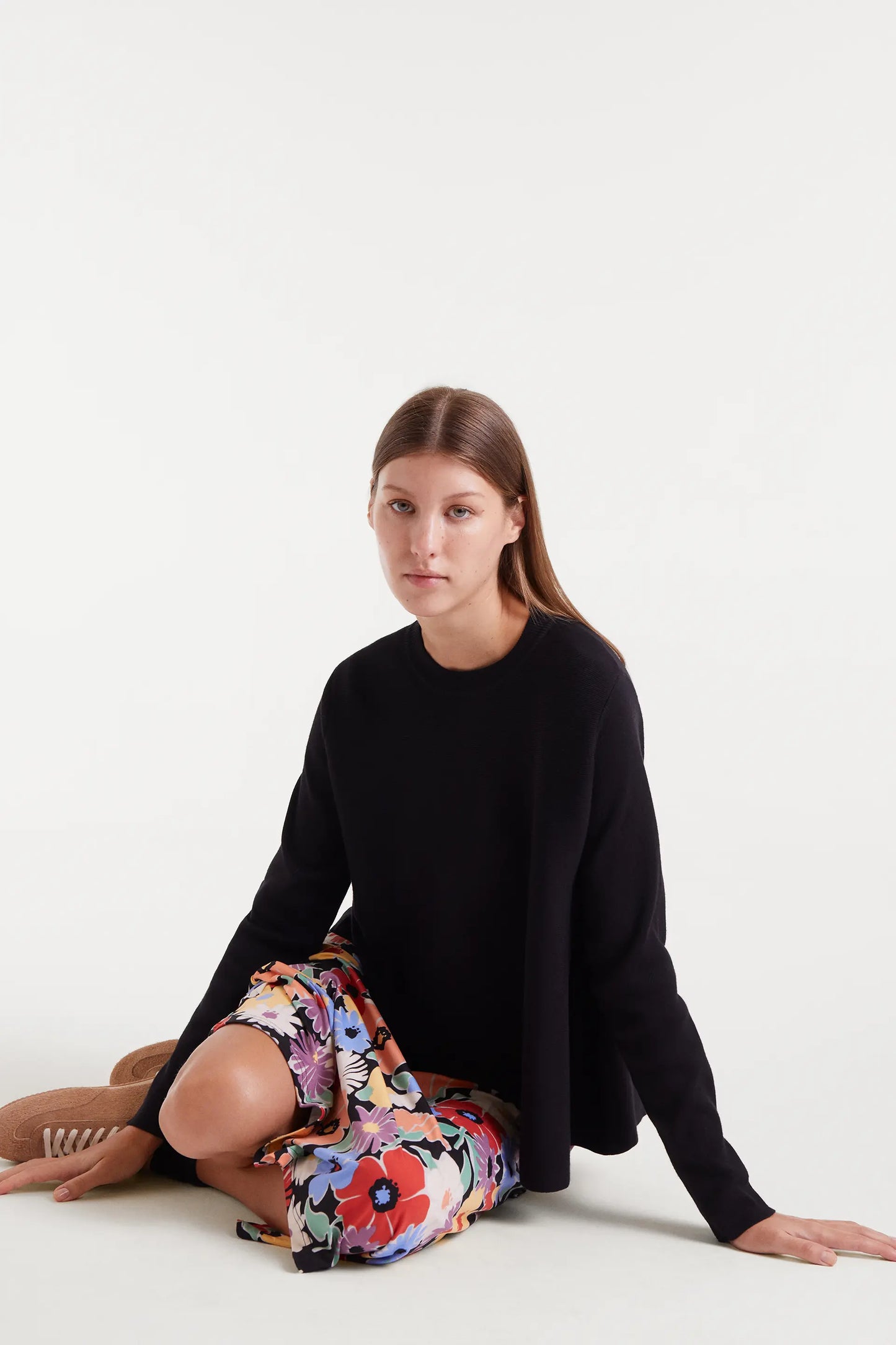 Black flared knit sweater