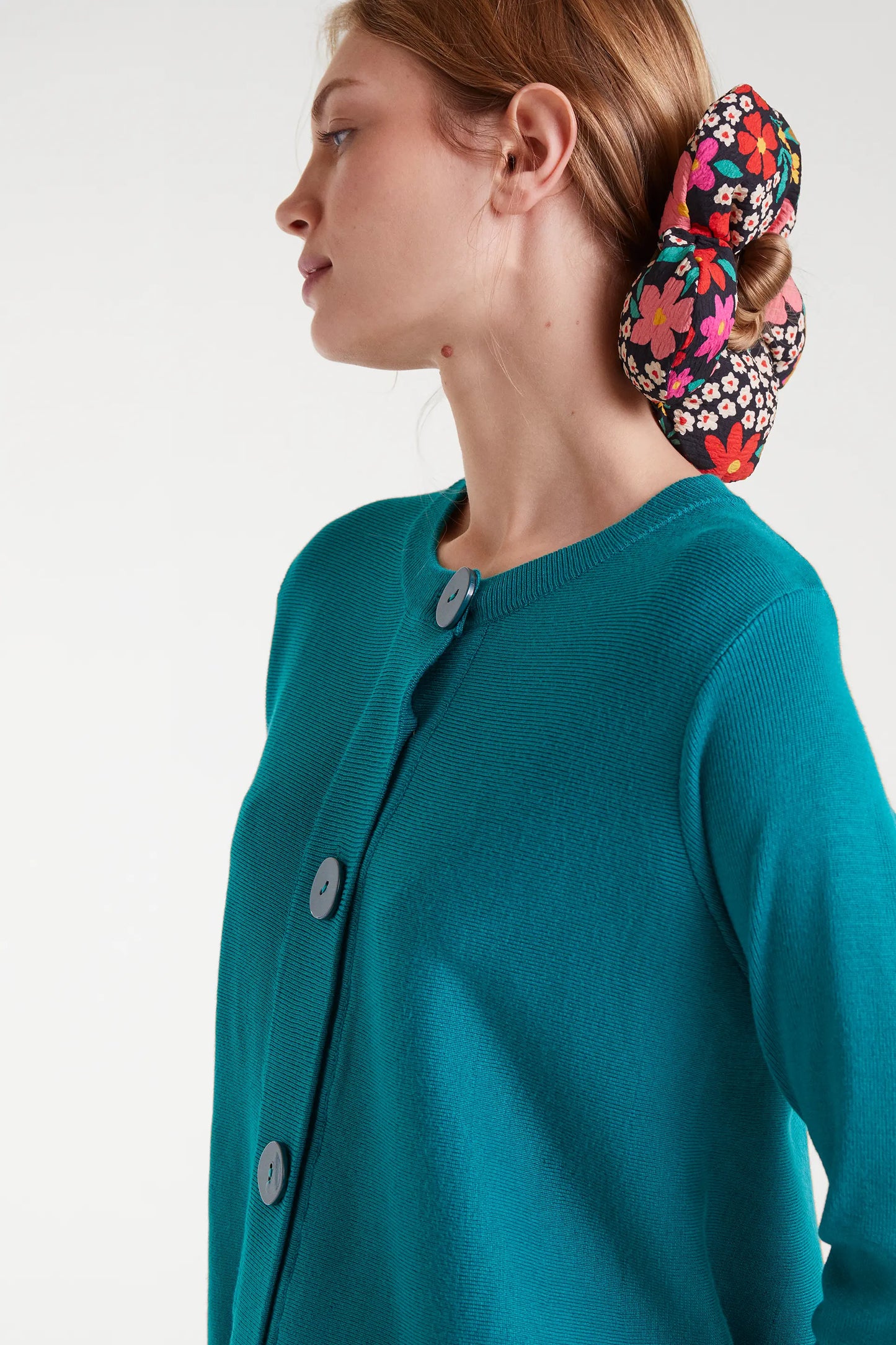 Cardigan verde svasato in maglia