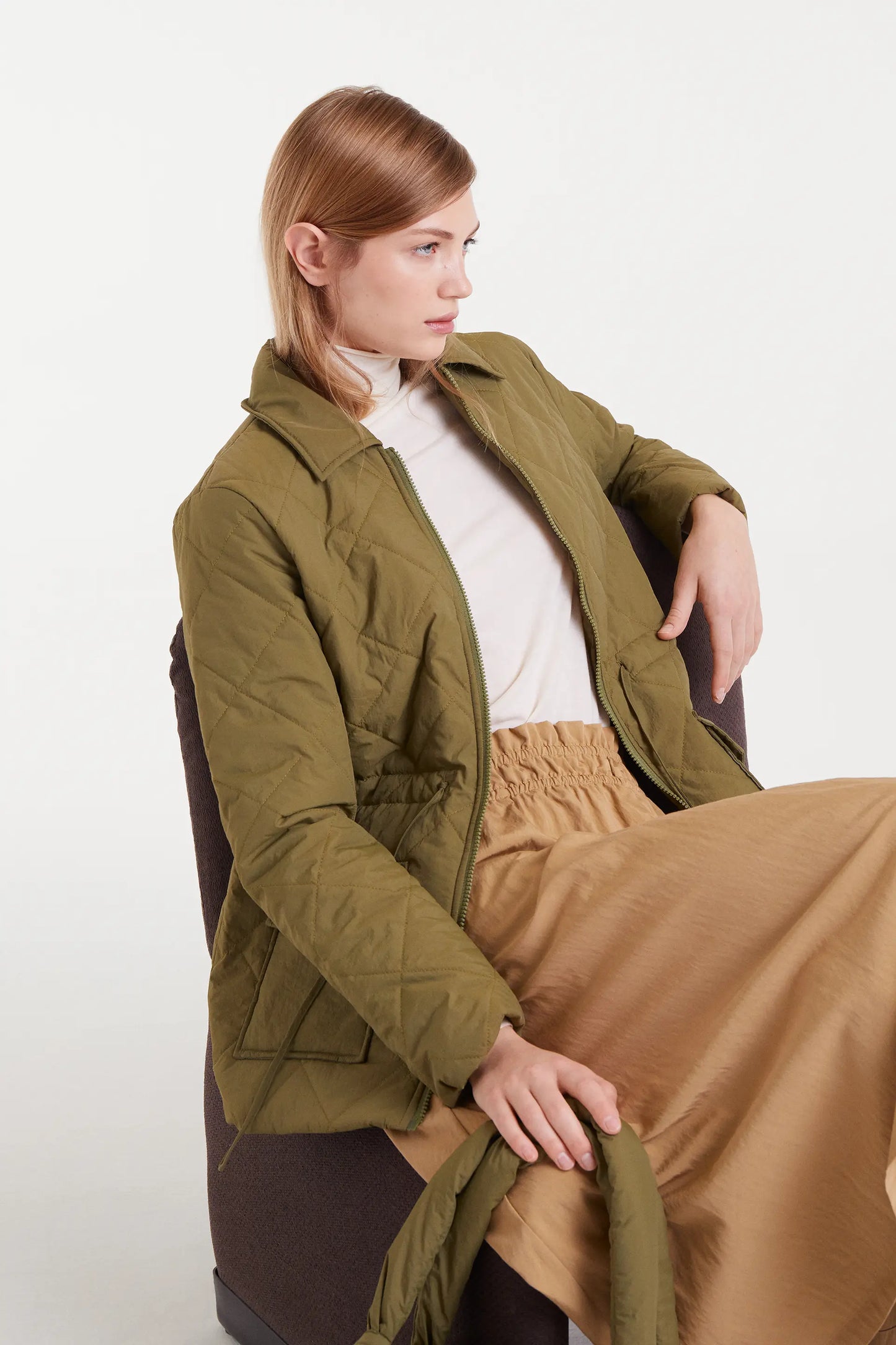 Short green coat
