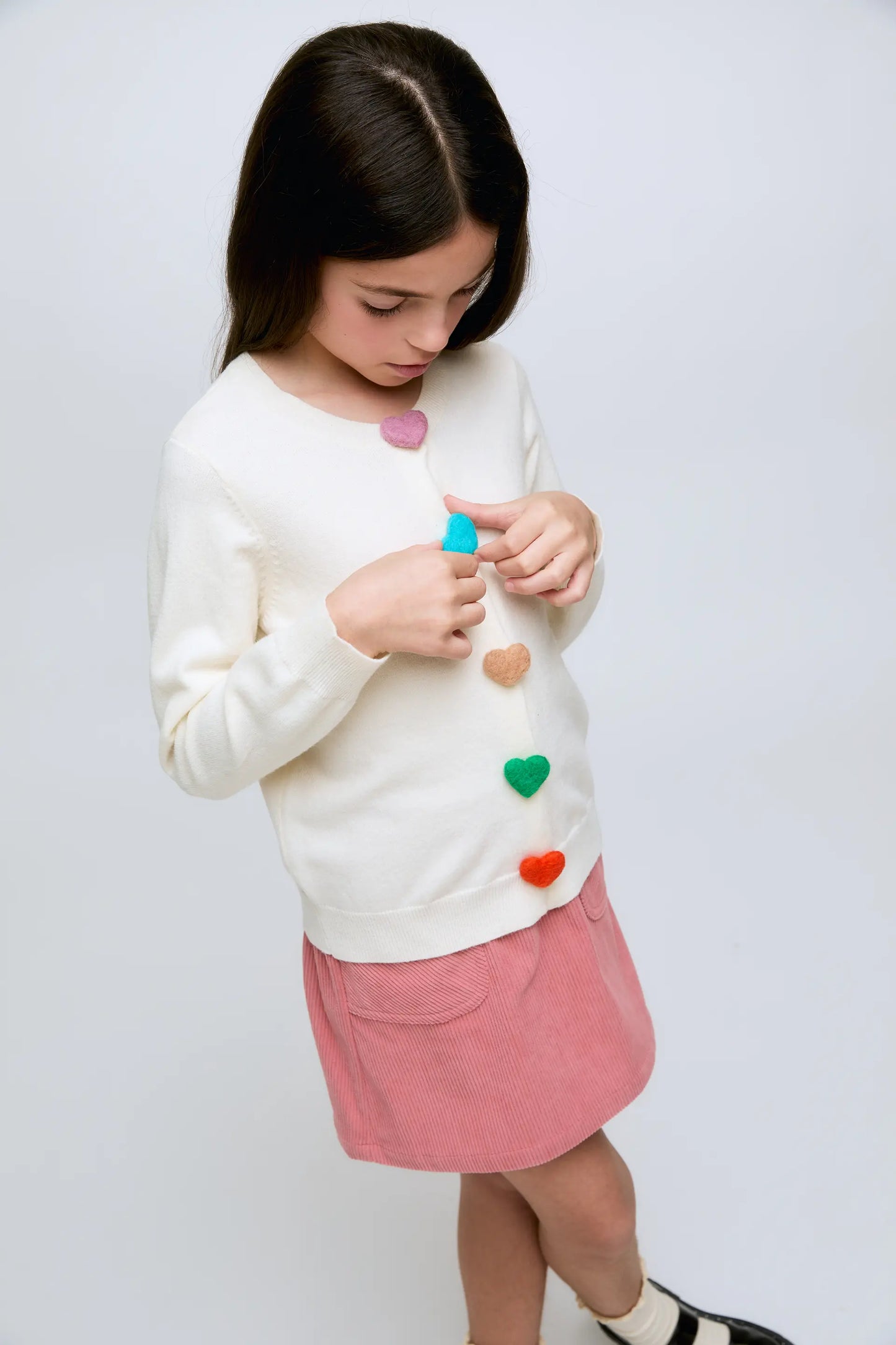 Girl's cardigan with white heart button detail