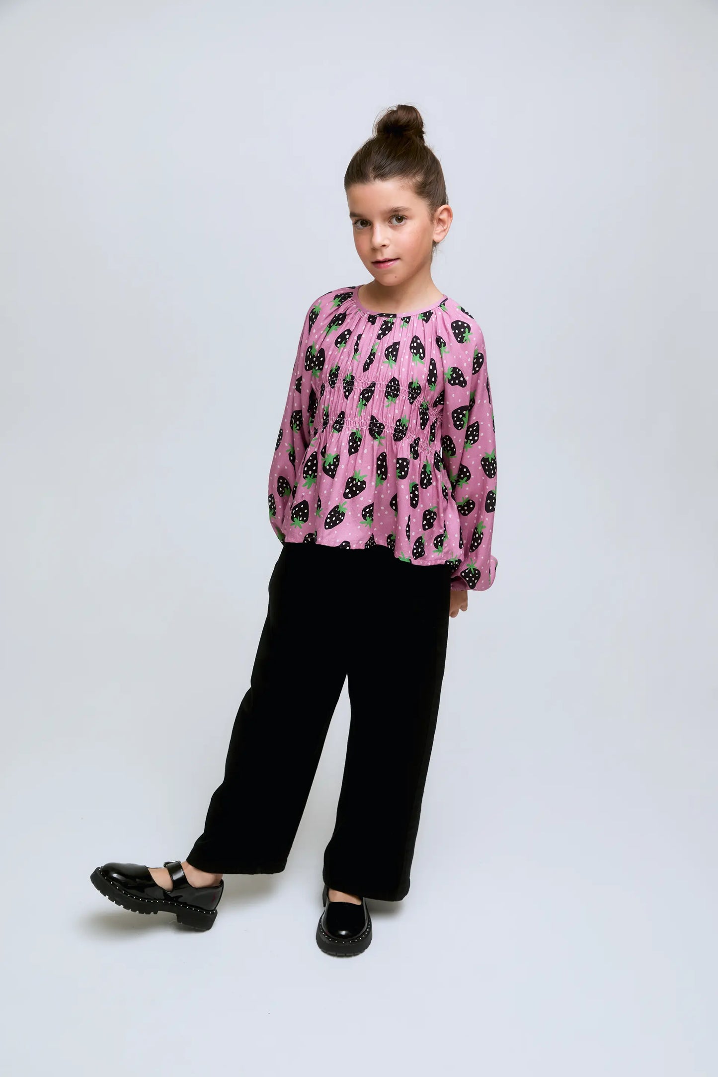 Girl's top with Morango strawberry print and decorative gathers.