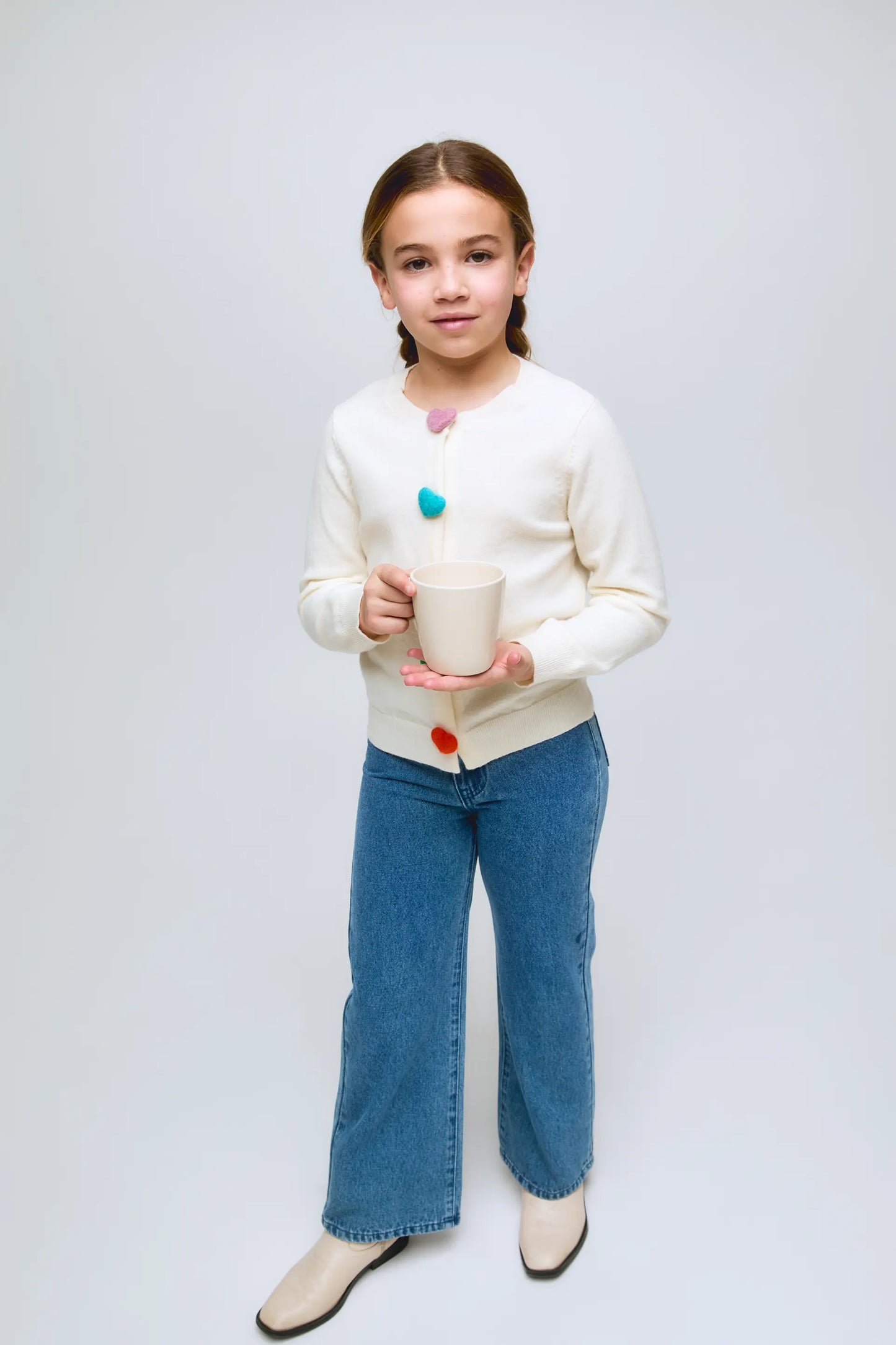 Jeans blu da bambina con dettaglio a cuore sulle tasche