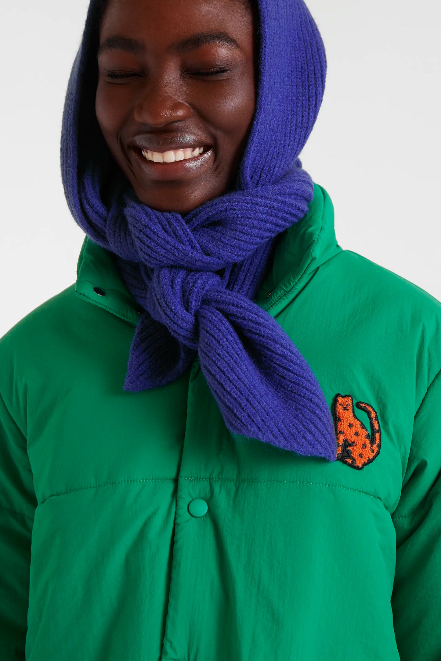 Cappotto trapuntato verde con dettaglio Jaguar