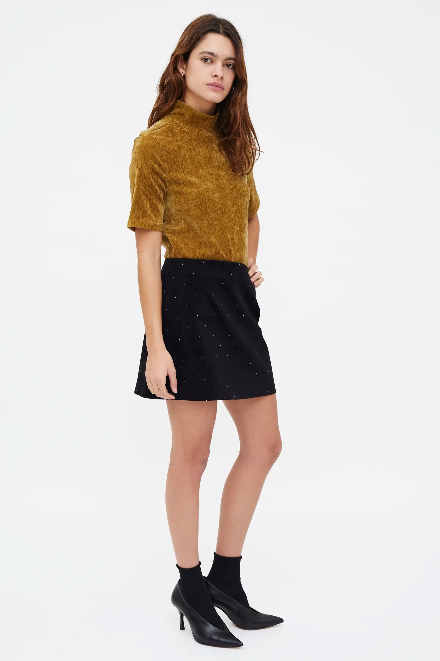 Short black velvet skirt