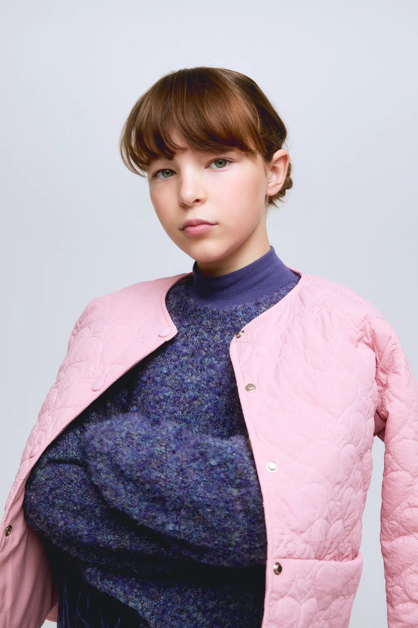 Girl's blue sweater with a mottled finish