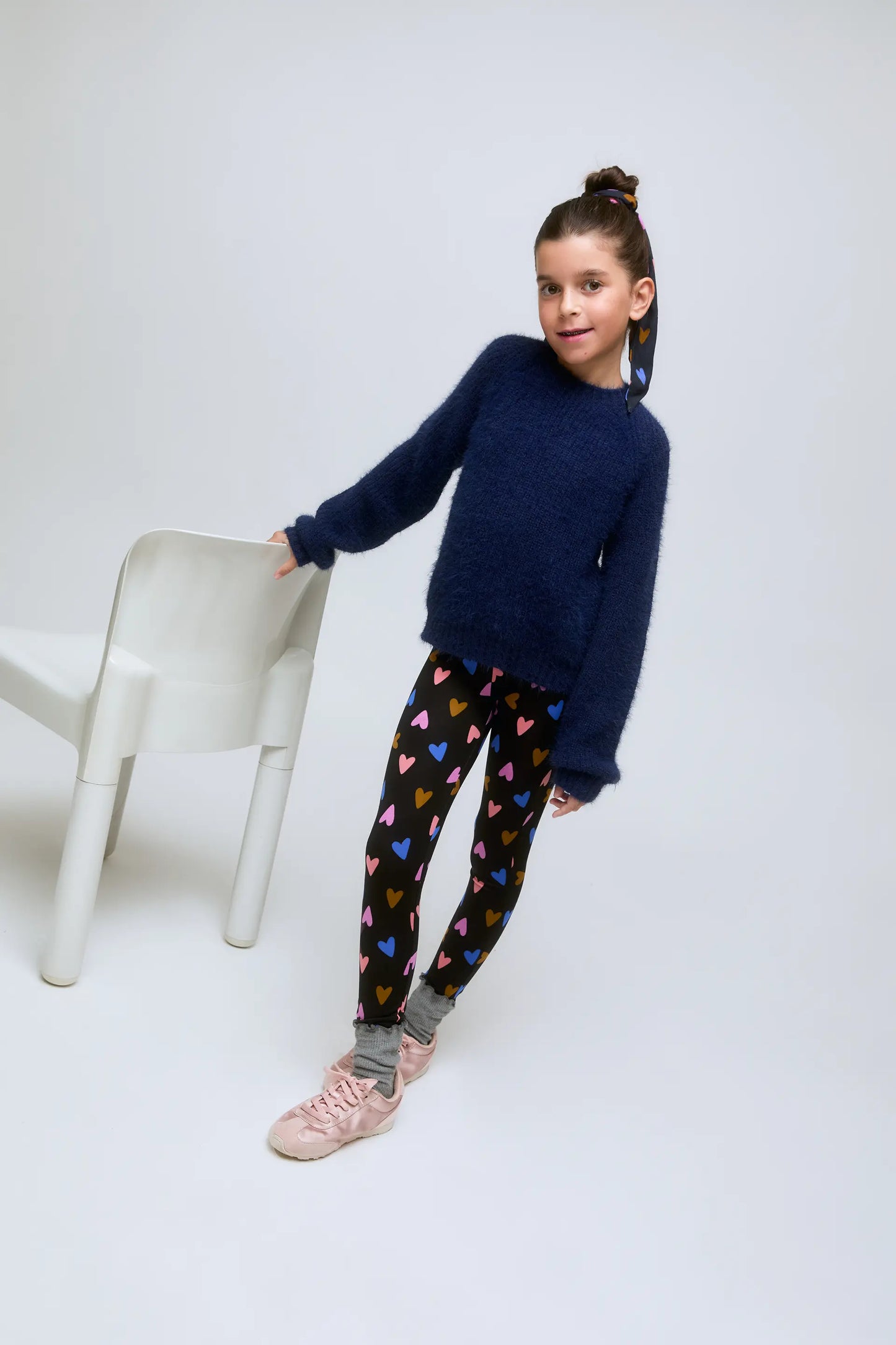 Blue knitted girl's sweater.