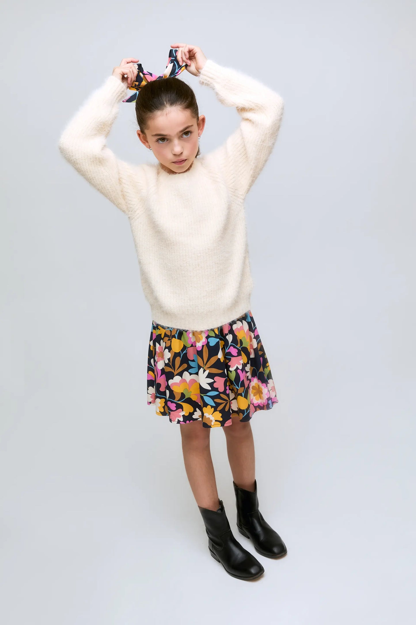 White knitted girl's sweater