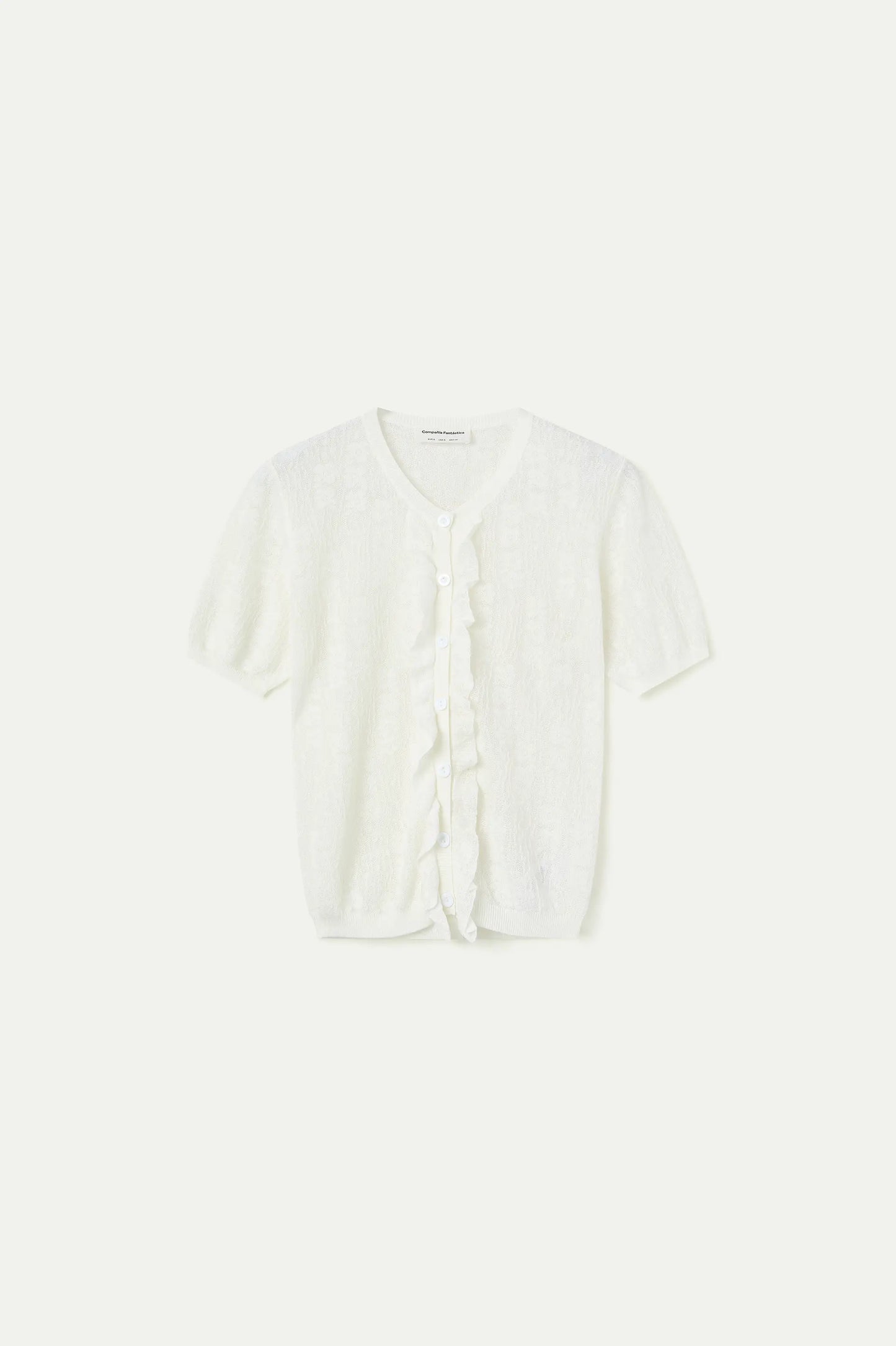 Cardigan in maglia floreale bianca con volant