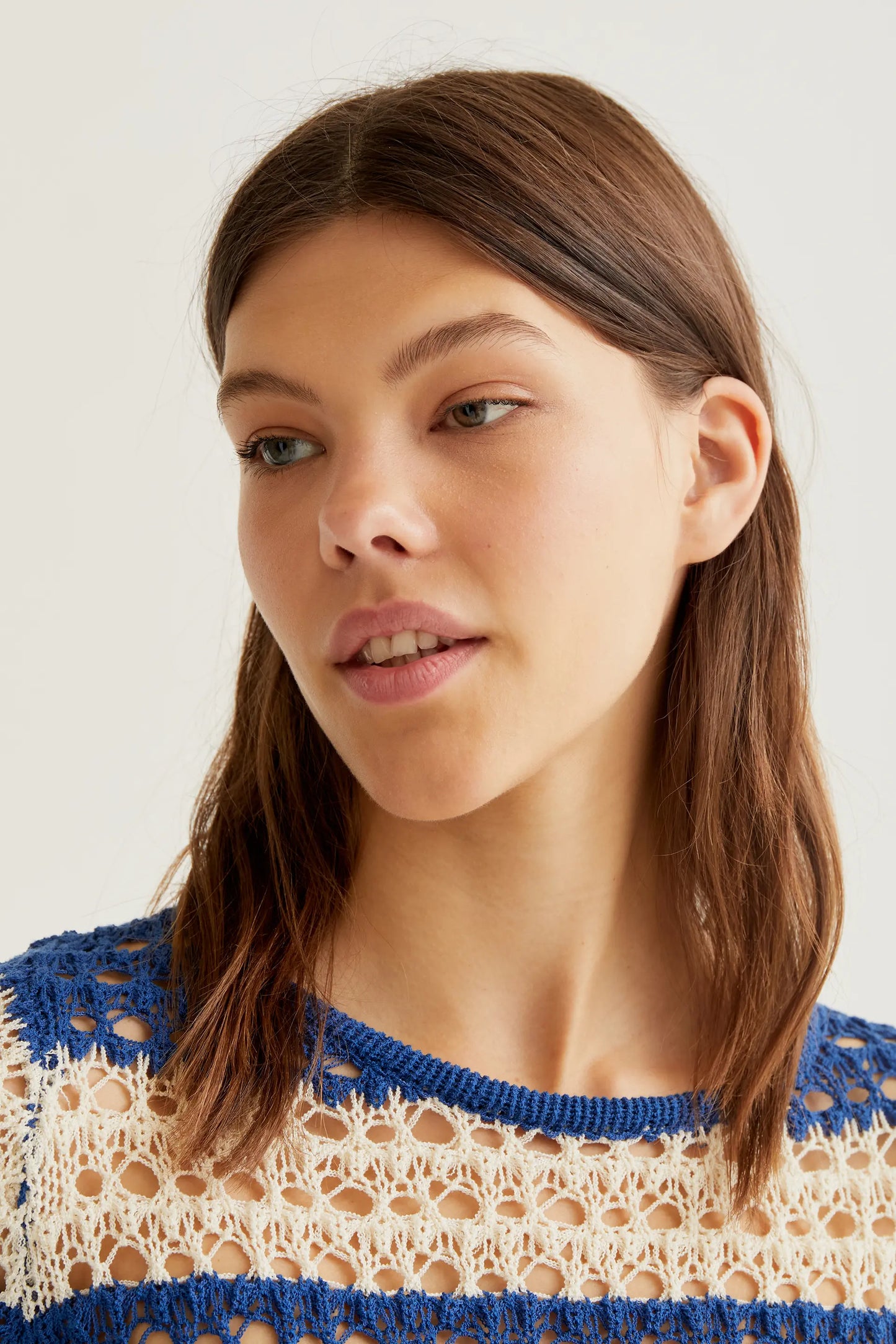 Openwork knit top with white and blue stripes