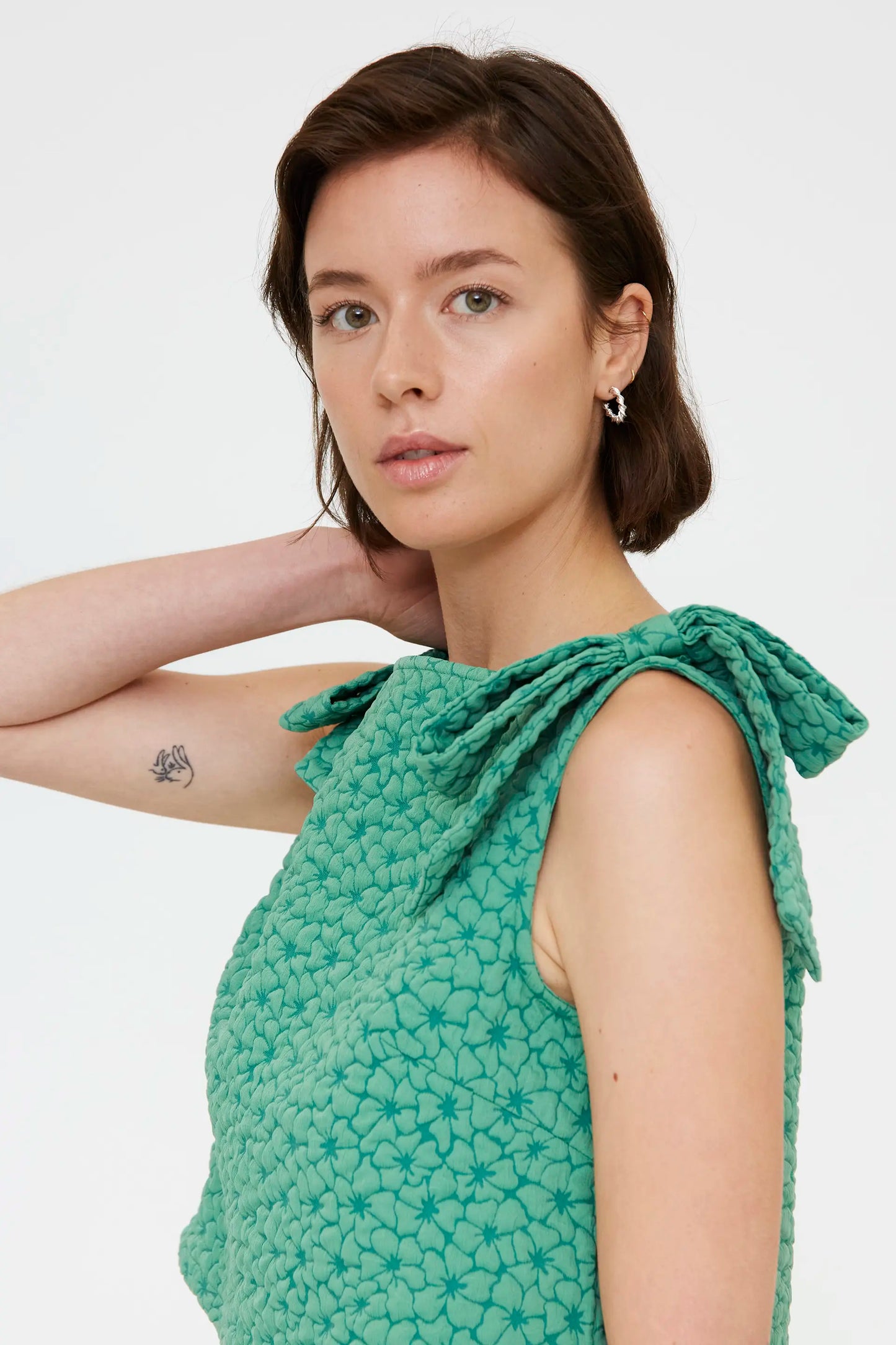 Top con trama floreale verde