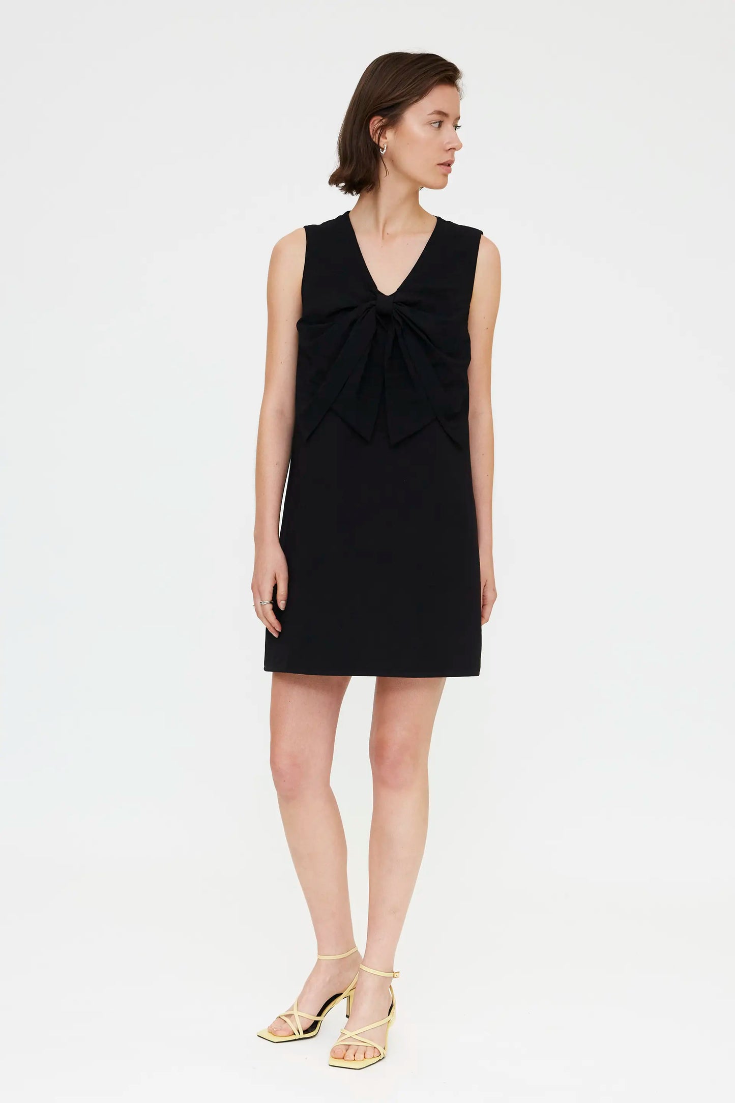 Short black dress with tie detail