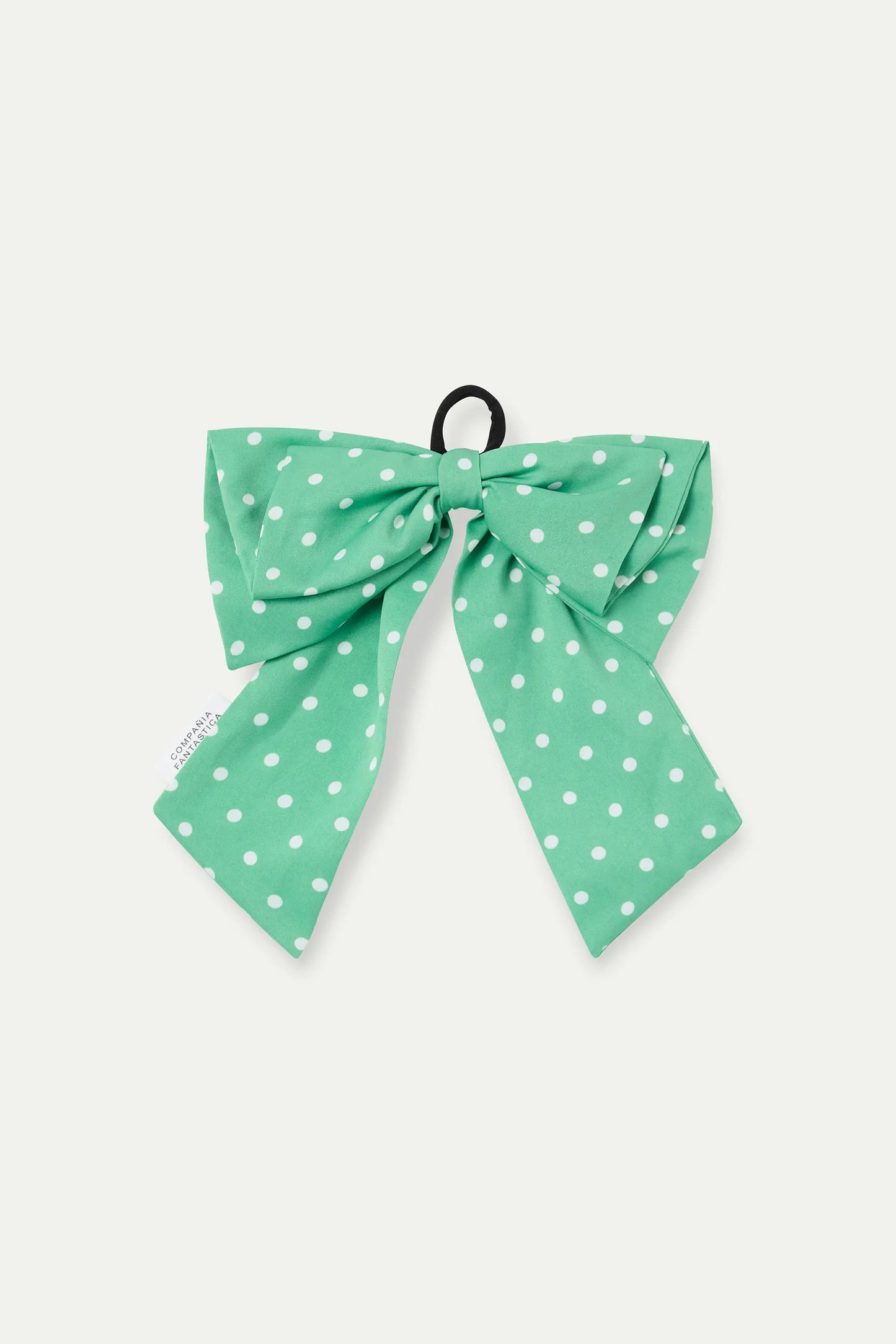 Scrunchie con fiocco verde e stampa a mini pois bianchi
