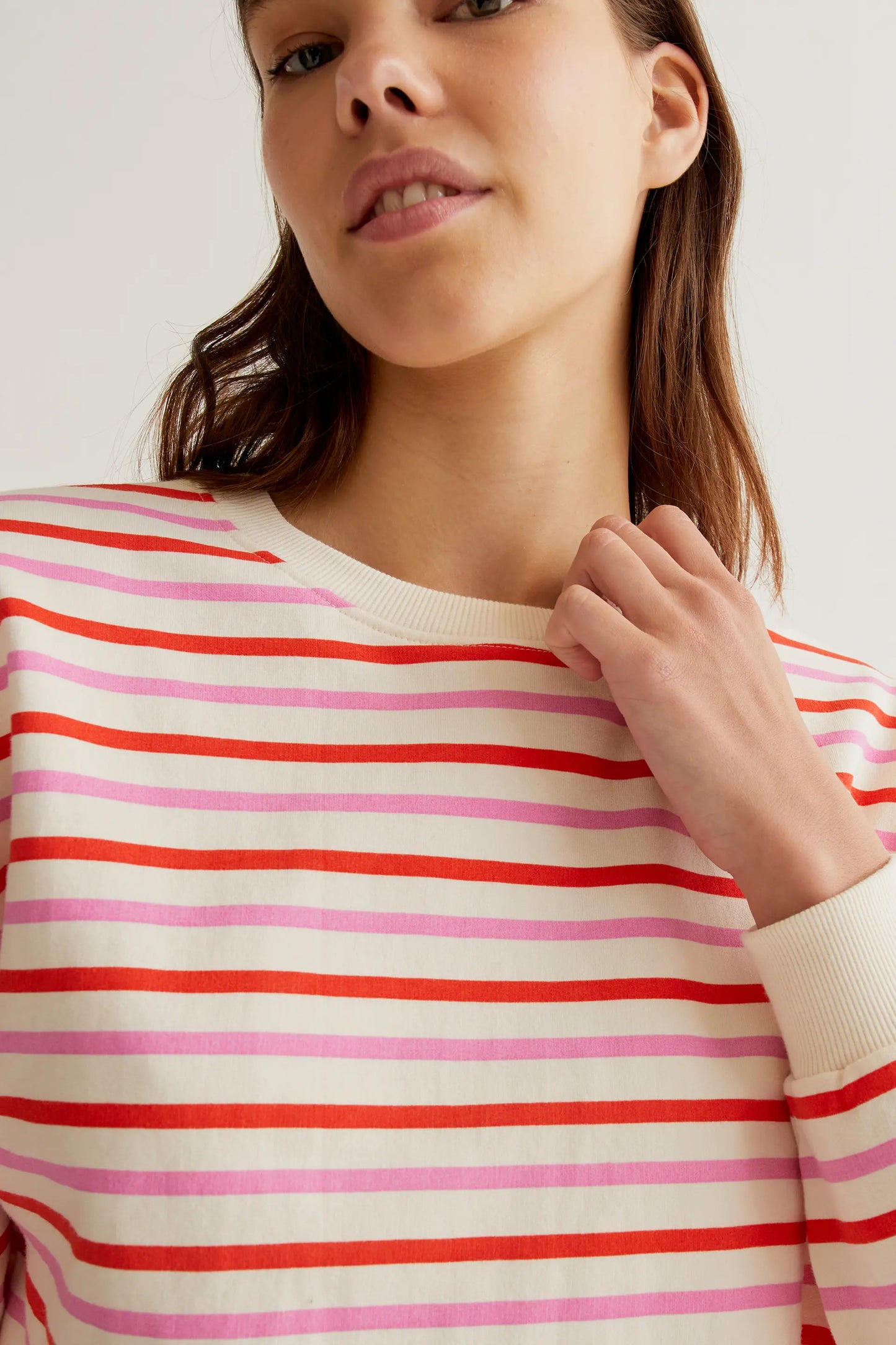 Sweatshirt with pink and red striped print
