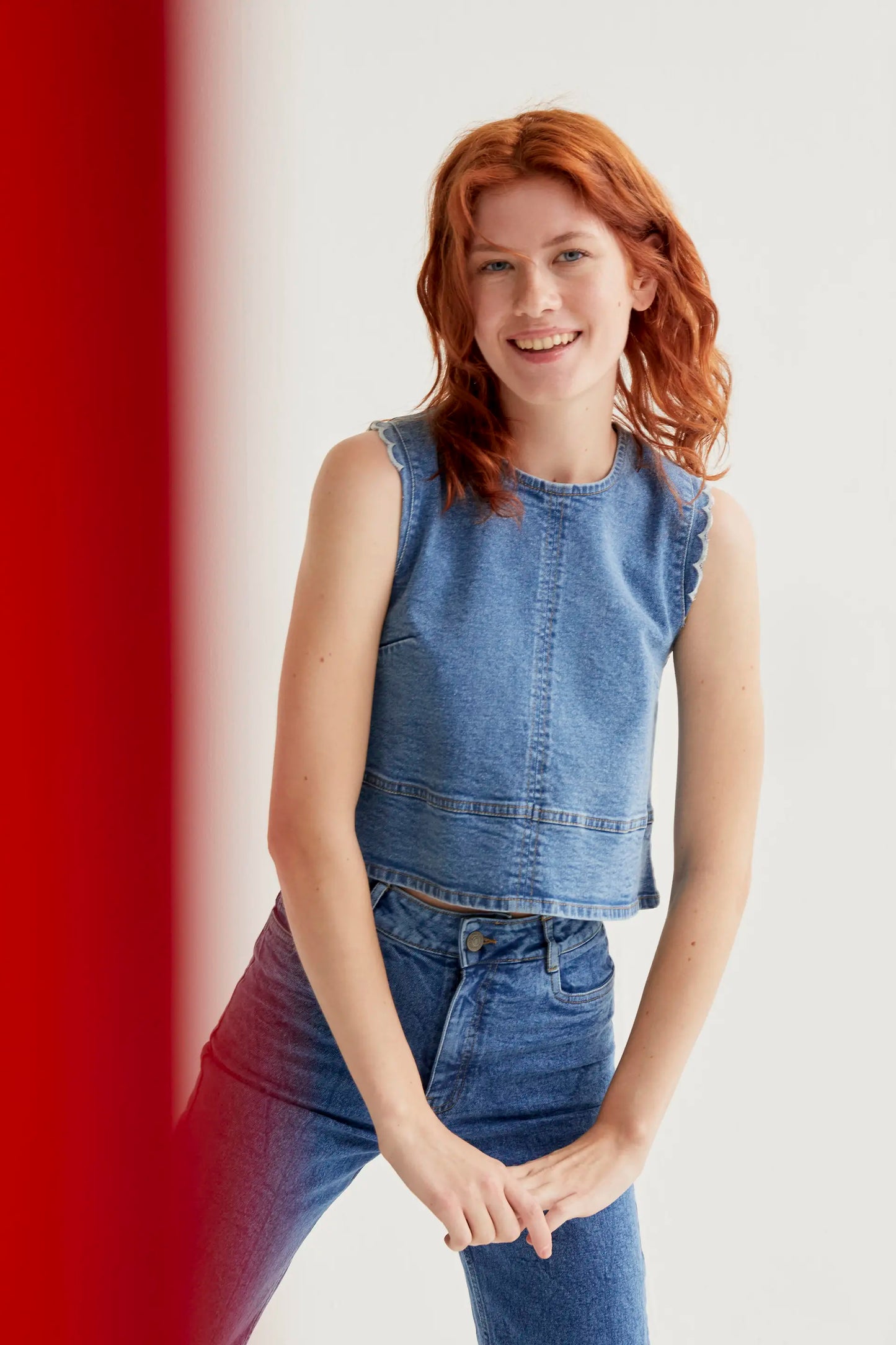 Blue denim top with wavy details