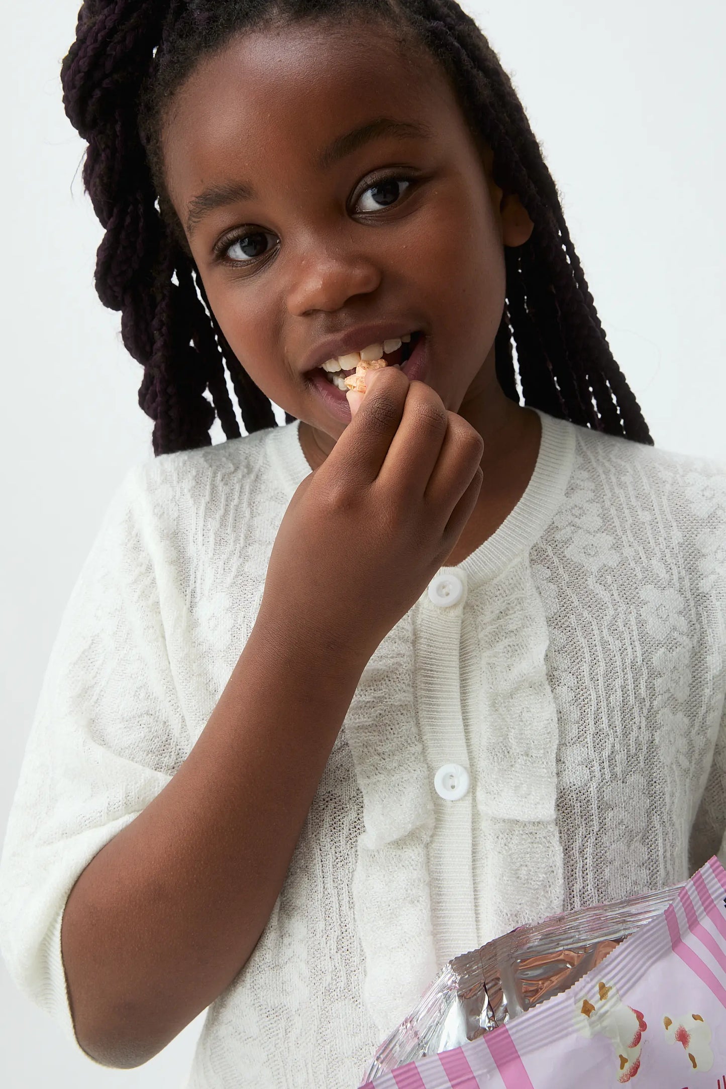 Cárdigan de niña punto blanco