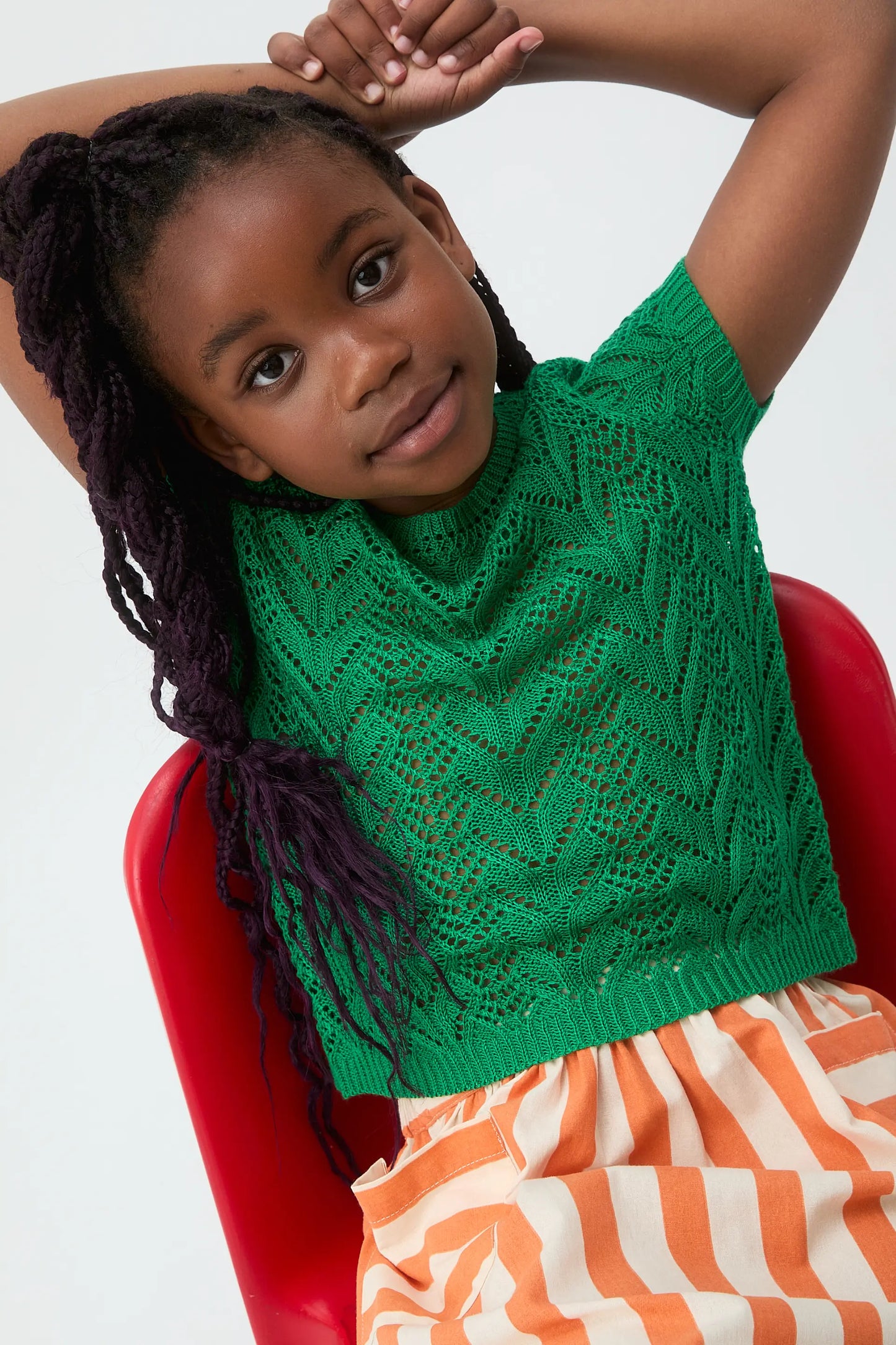 Girl's sweater with green embroidery