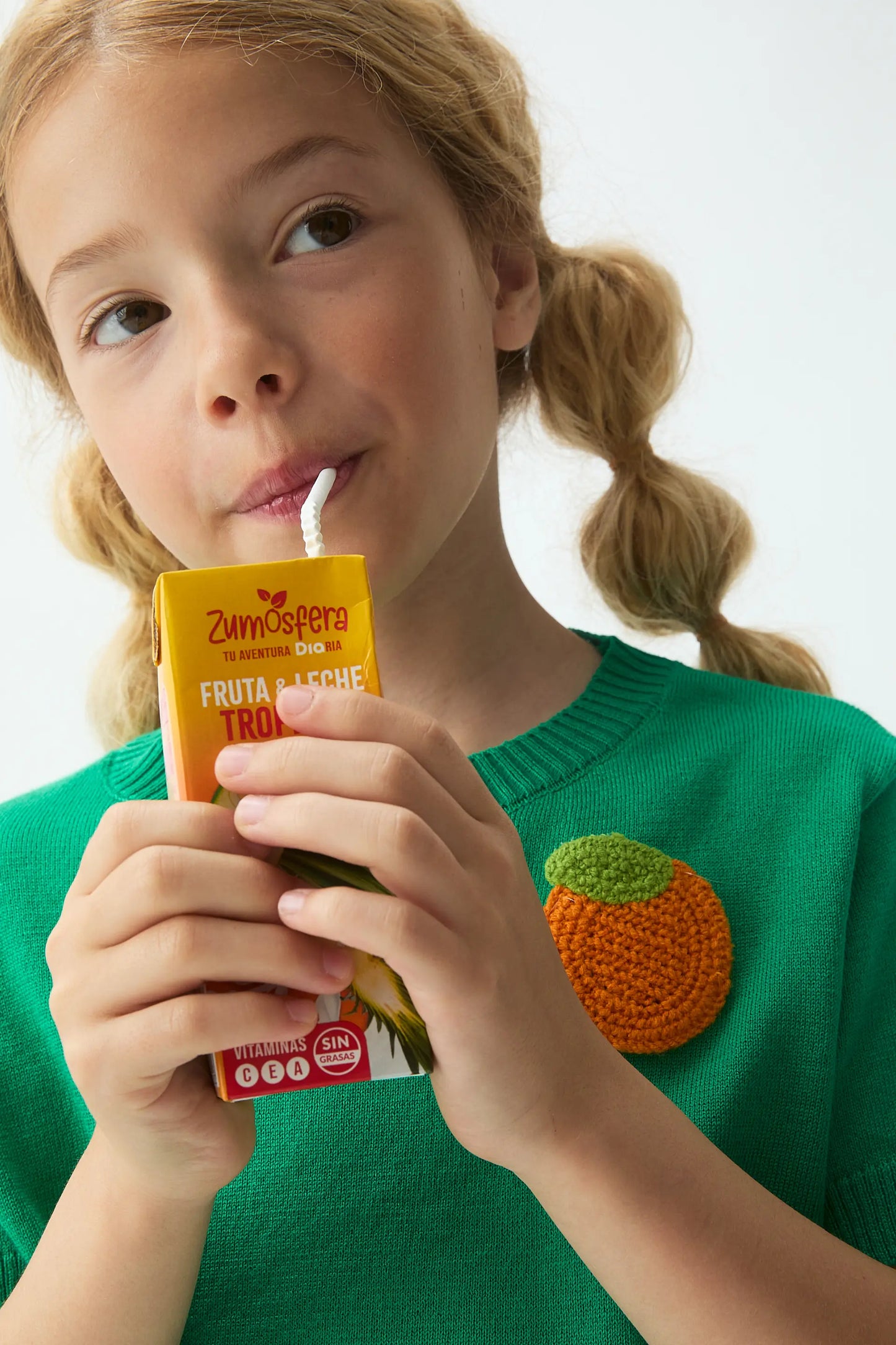 Girl's top with orange embroidery