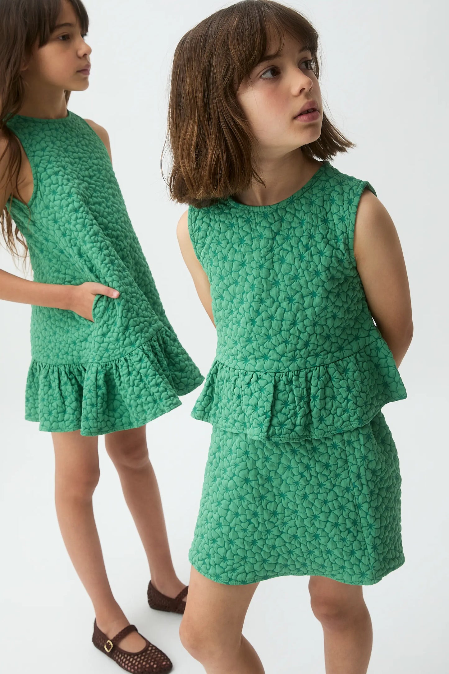 Short girl's dress with green floral print