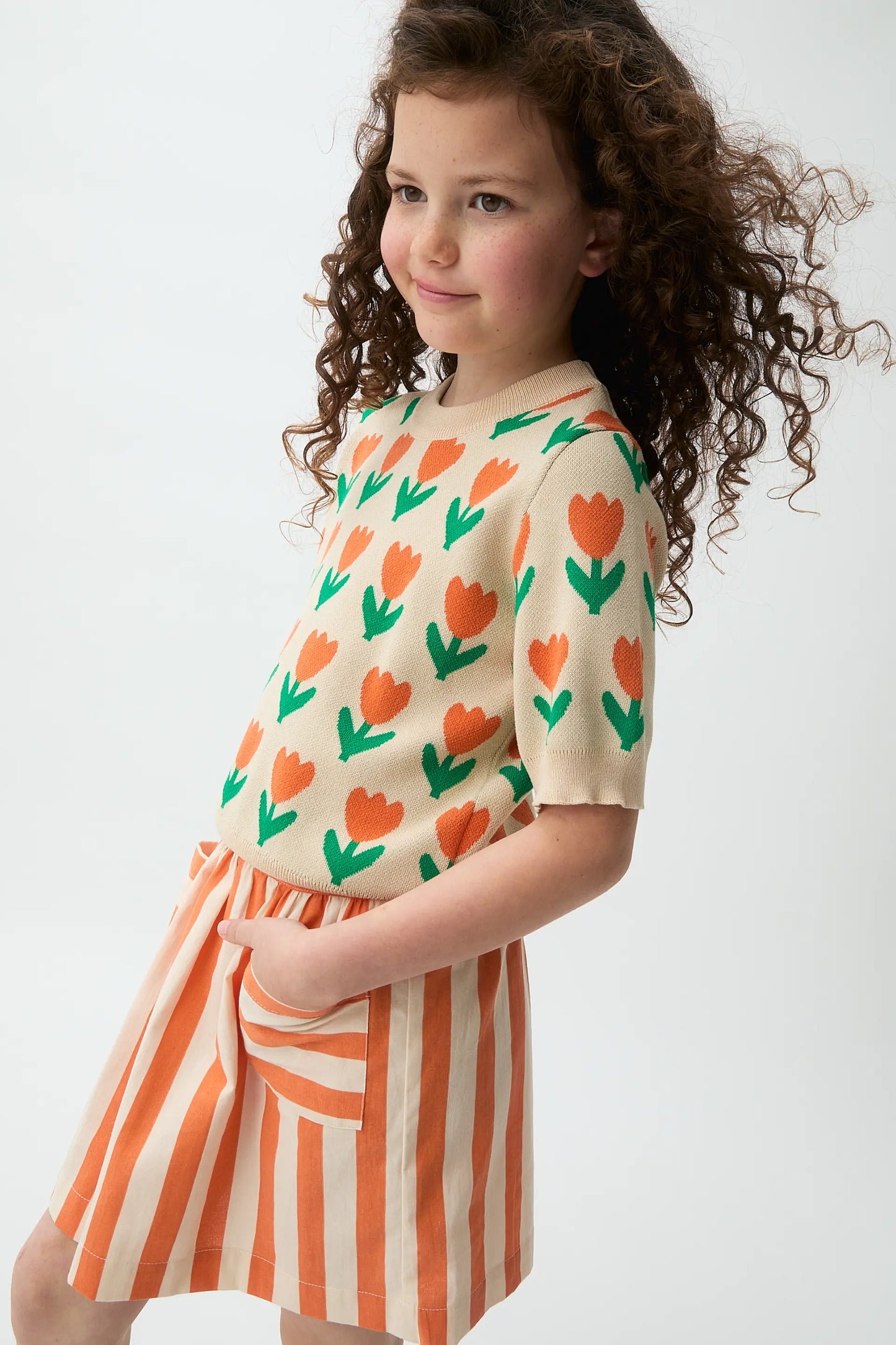Short skirt for girls with orange bamboo print