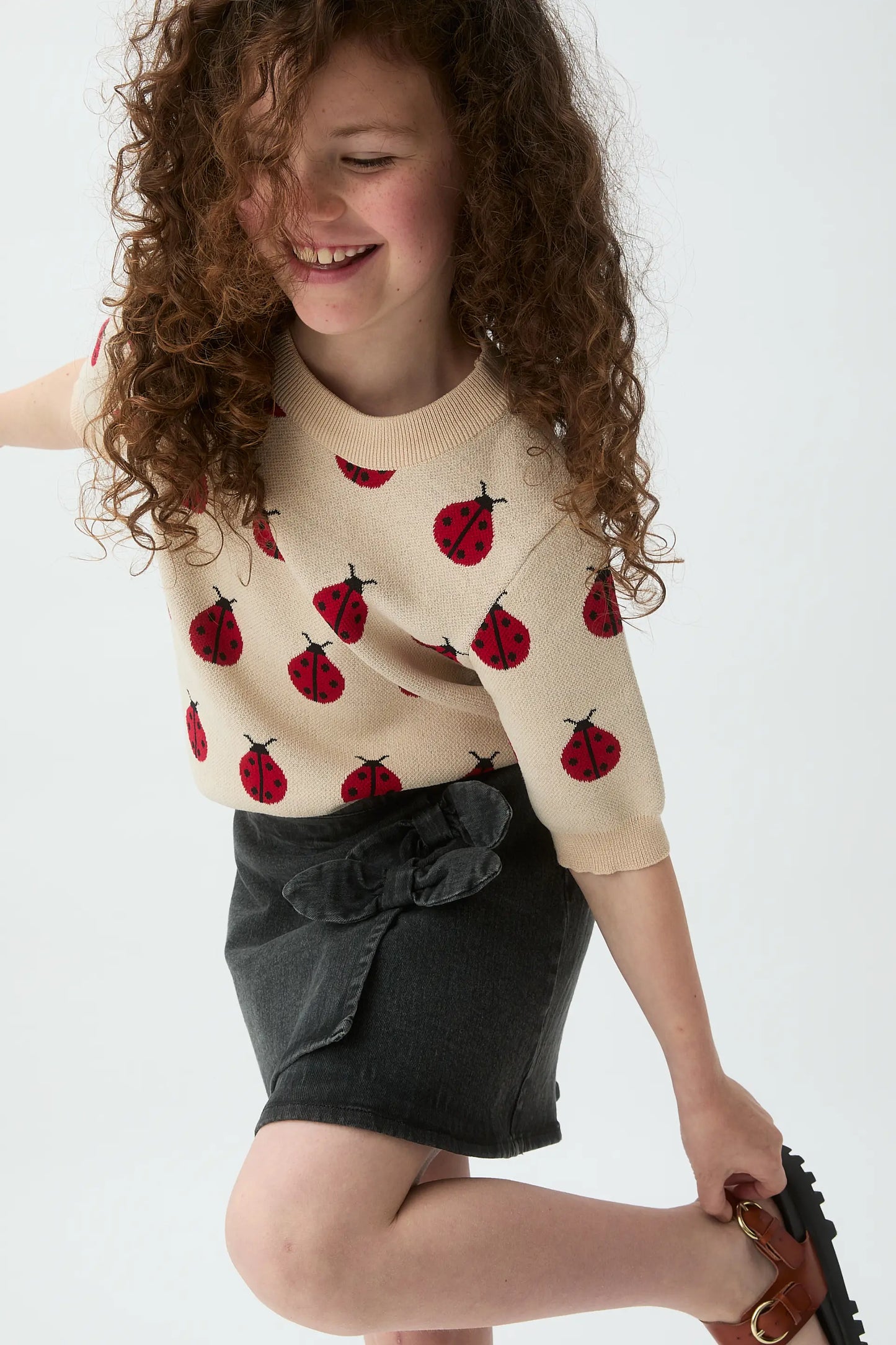 Falda corta de niña denim negro