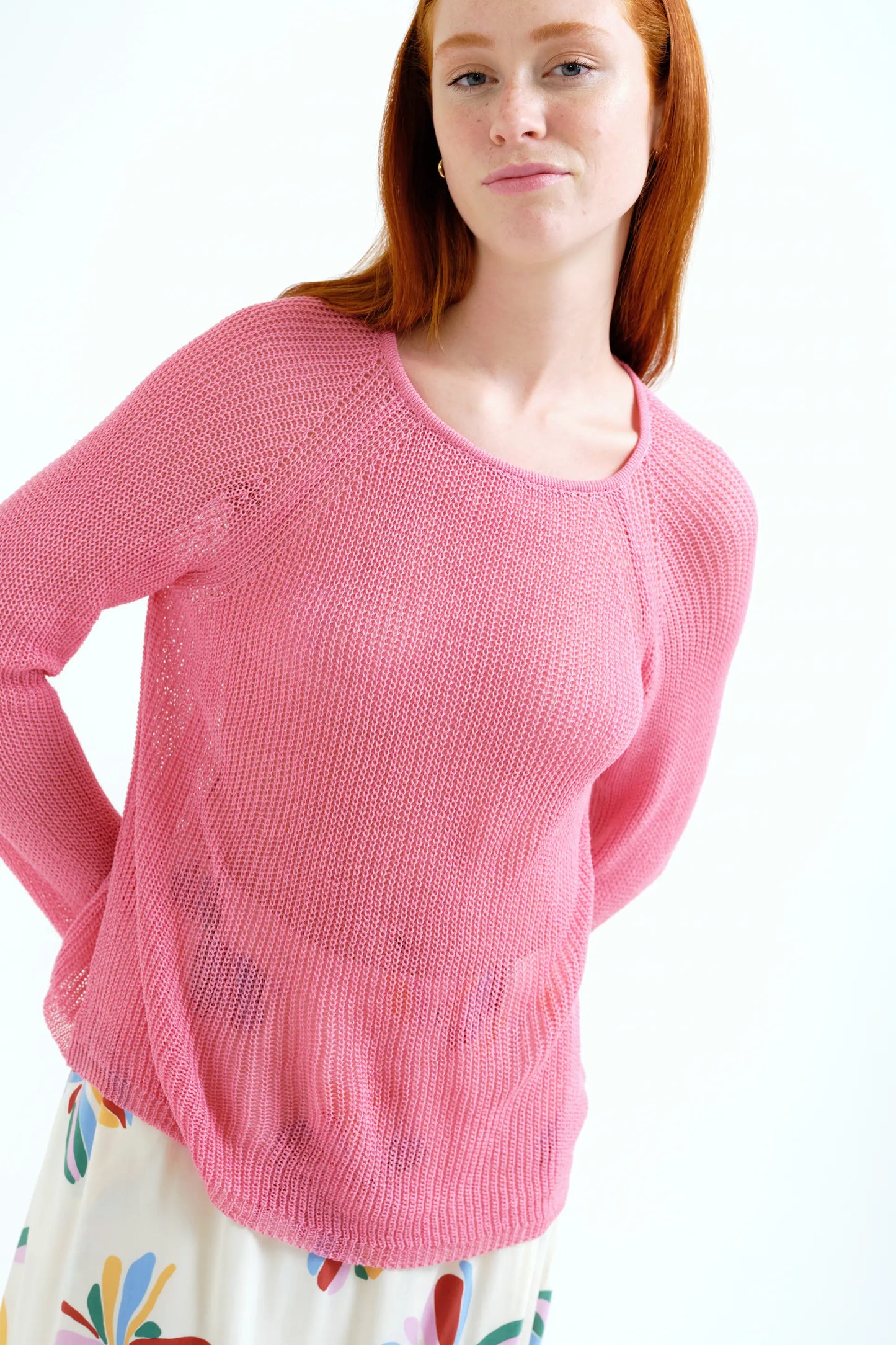 pink openwork knit sweater