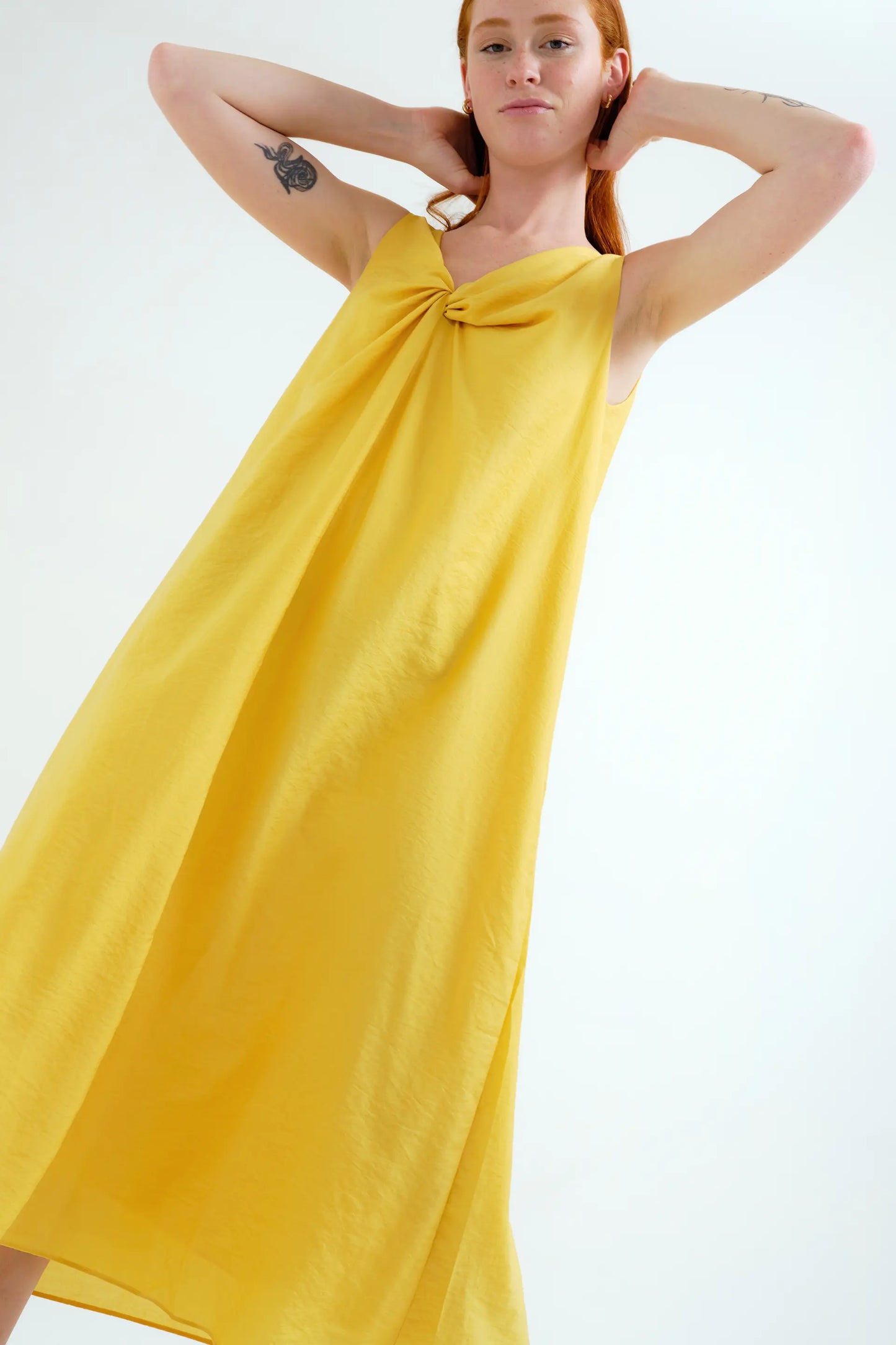 Long yellow dress with knotted detail
