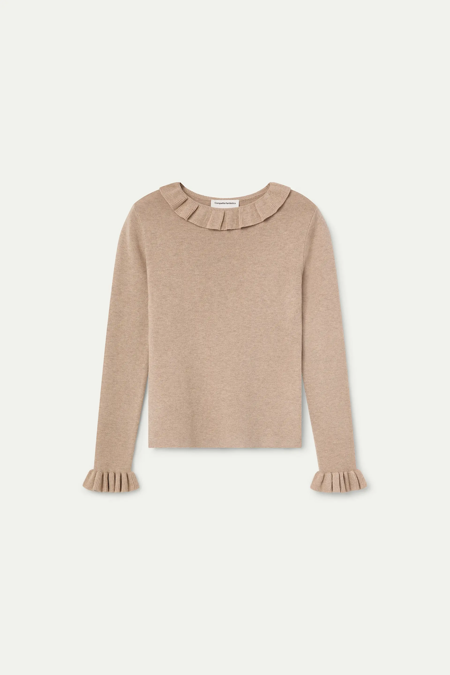 Top con volantes de punto beige