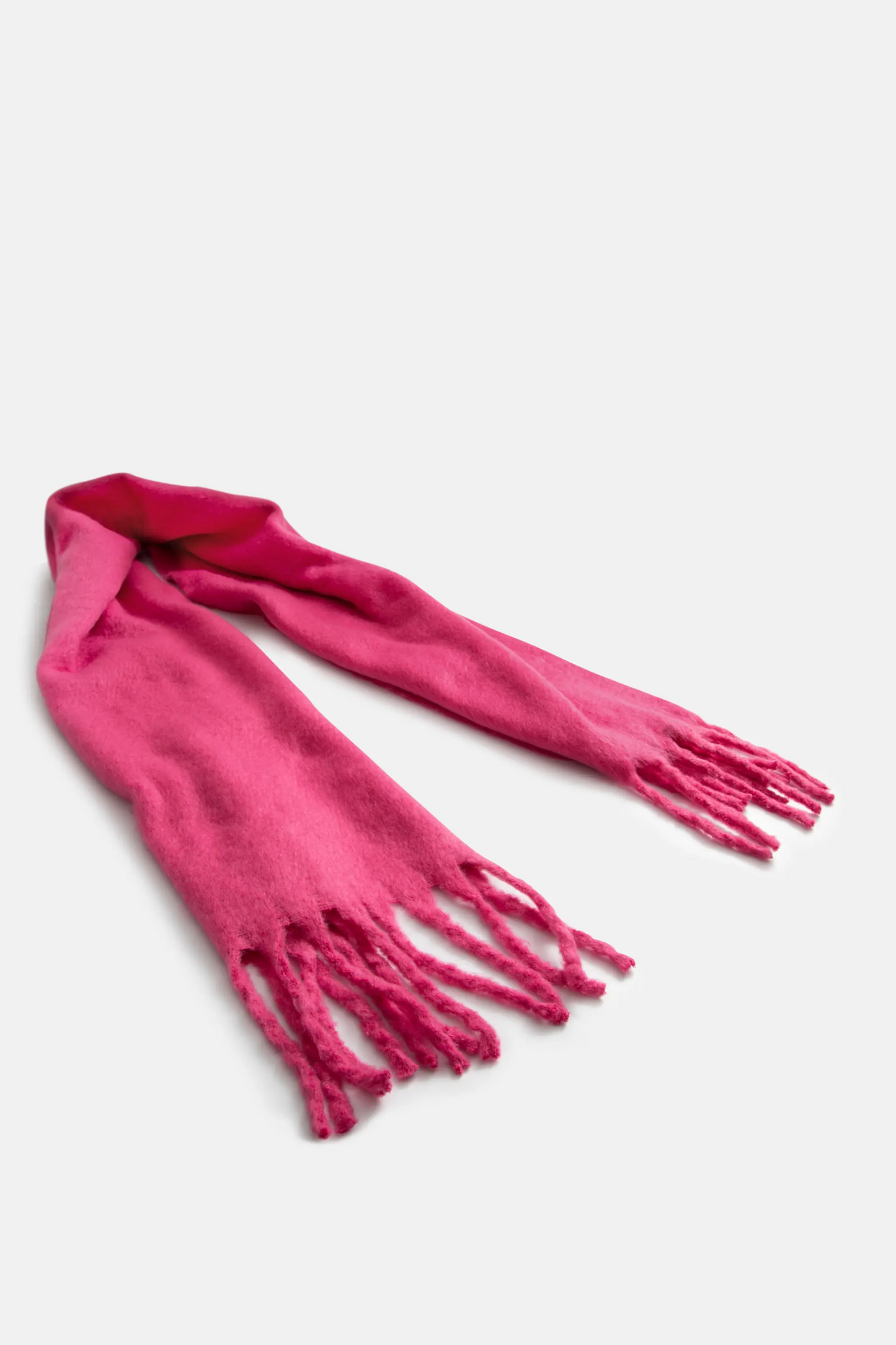 Bufanda de punto con flecos rosa