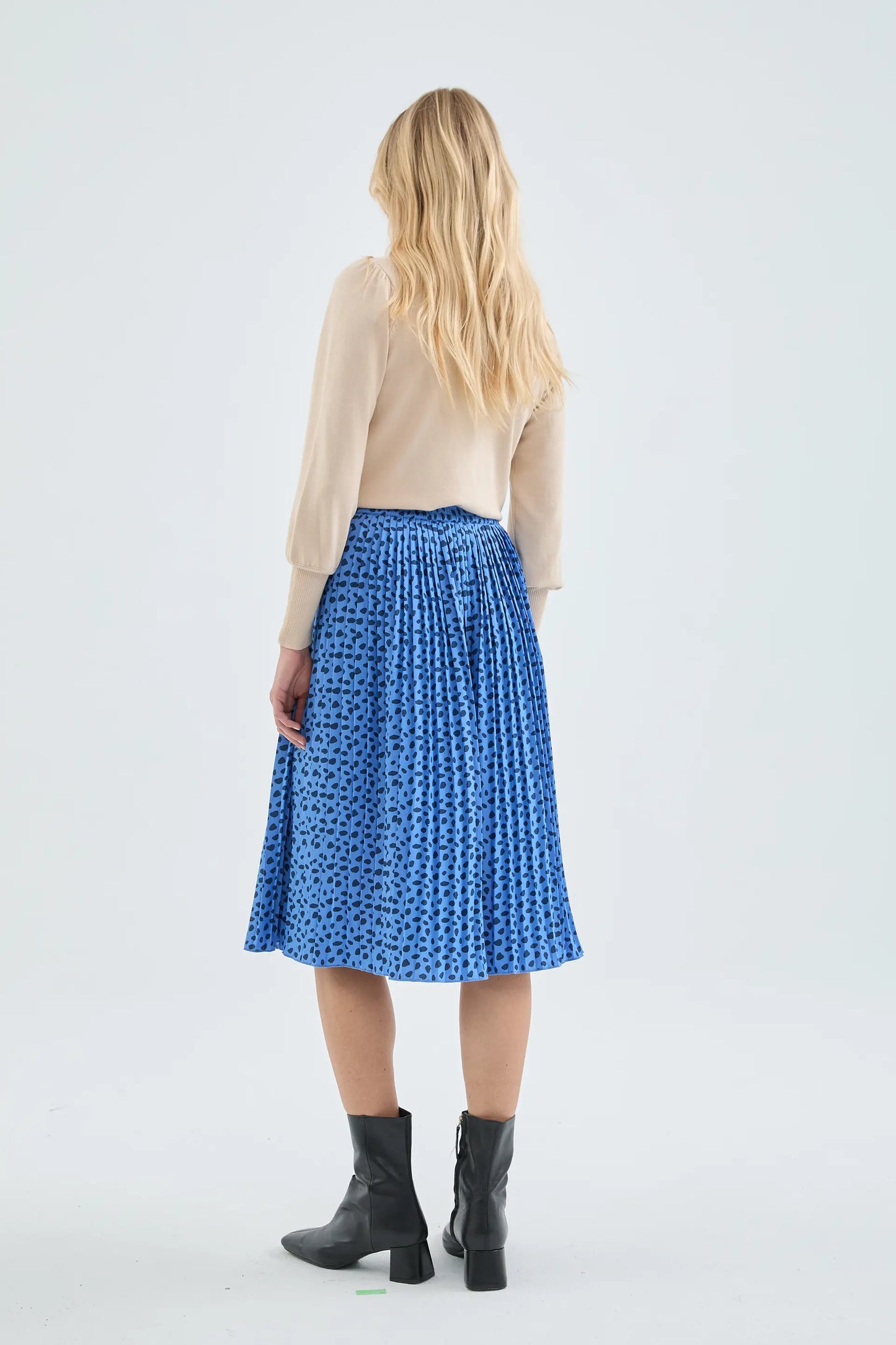 Falda midi plisada con estampado de lunares azul