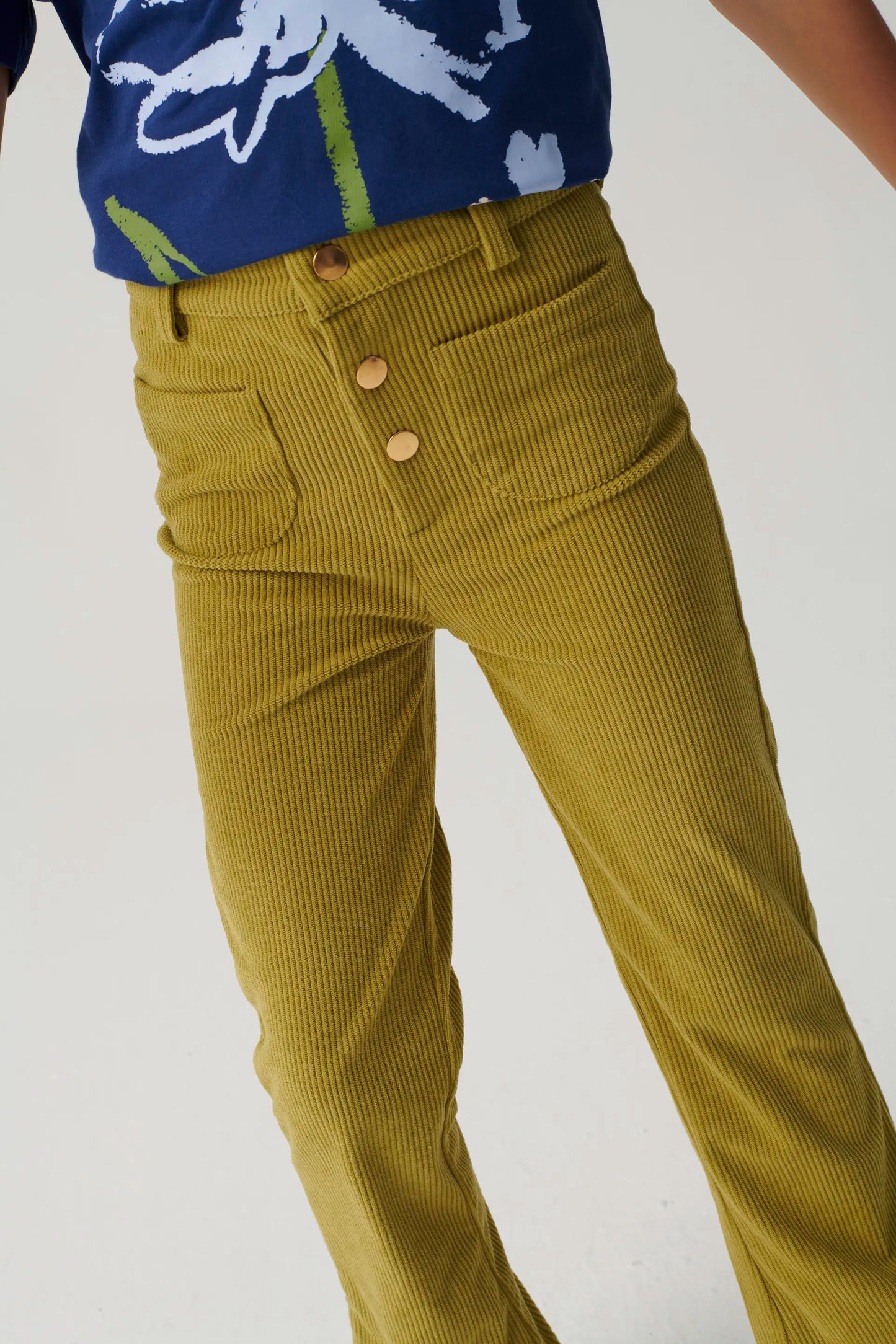 Girl's green corduroy pants