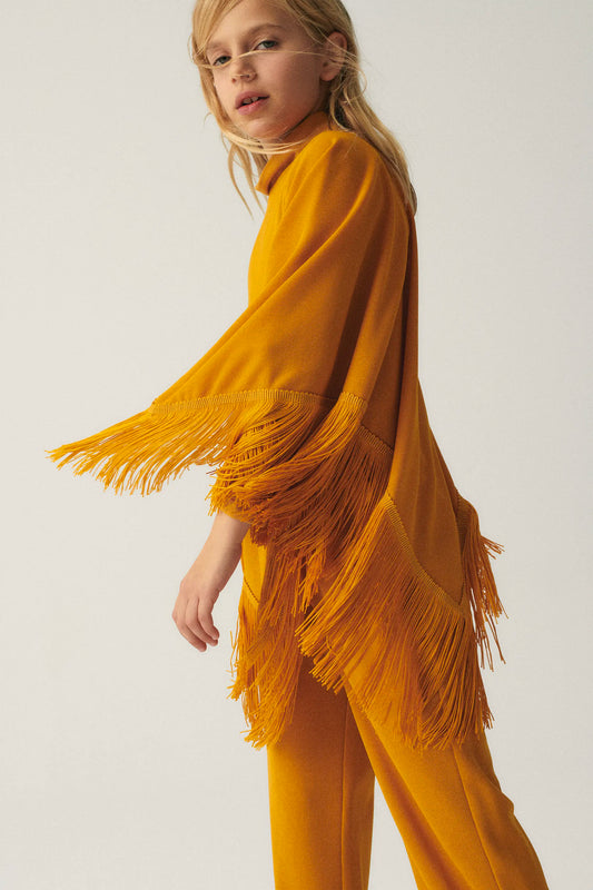 Girl's poncho with yellow fringes