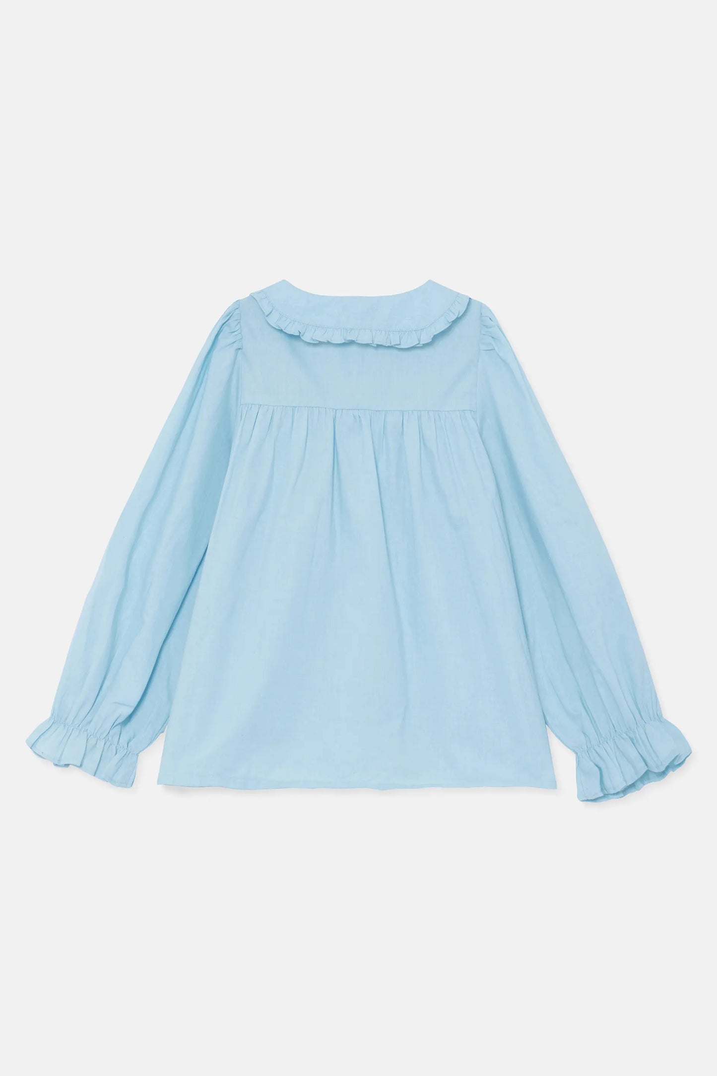 Camisa de niña con cuello bobo azul