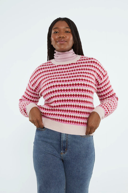 Cropped knitted sweater with pink structure