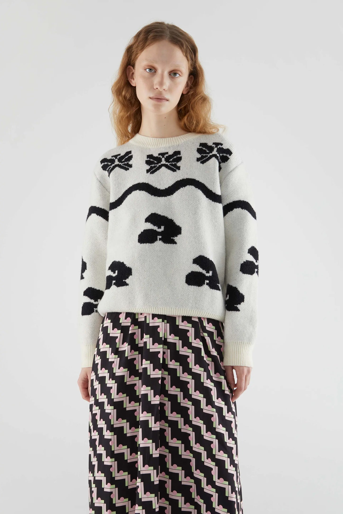 Jacquard knit sweater with black motifs