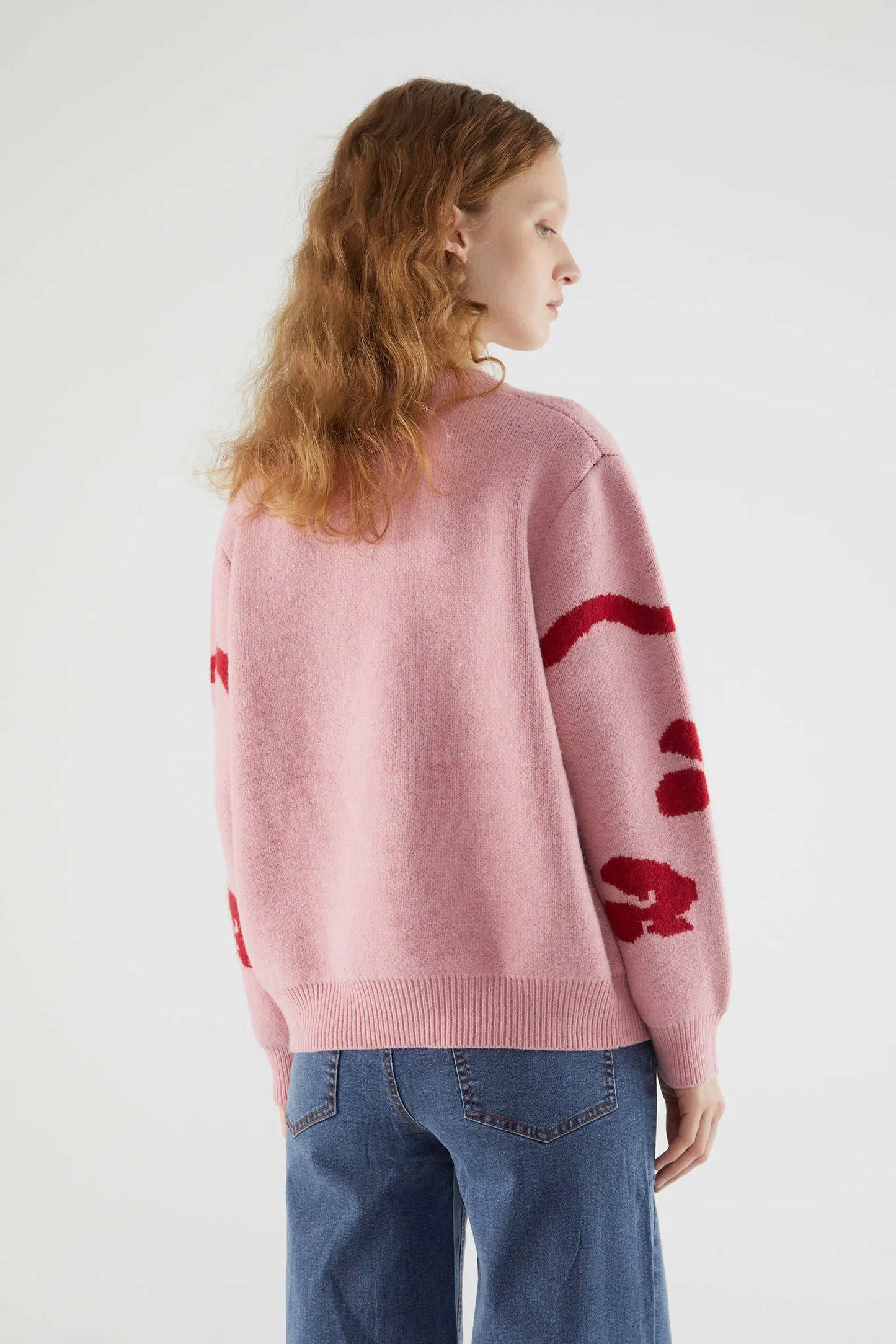 Jacquard knit sweater with pink motifs