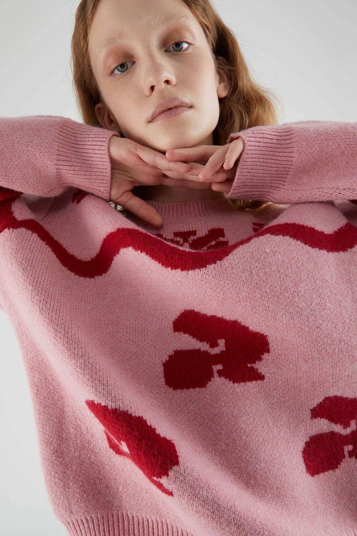 Jacquard knit sweater with pink motifs