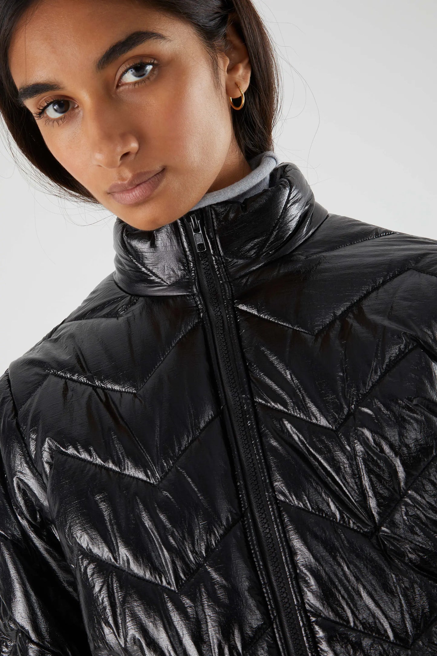 Short black shiny padded coat