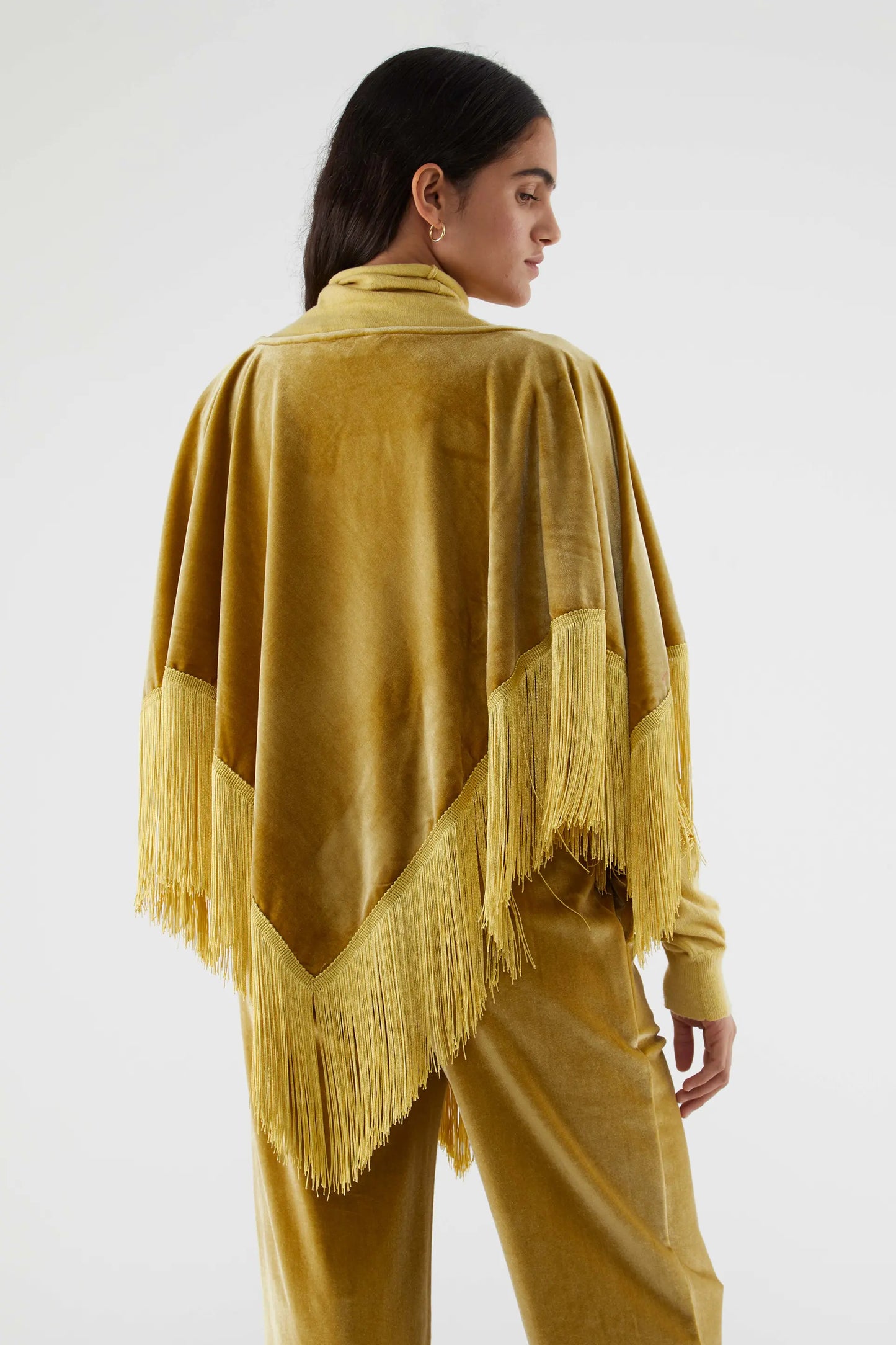 Velvet poncho with yellow yellow fringes