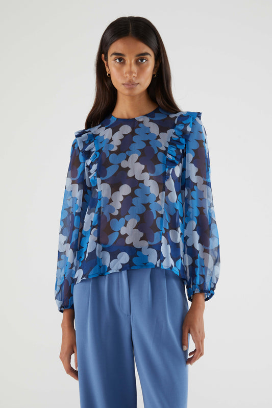 Blusa de manga larga con estampado abstracto azul