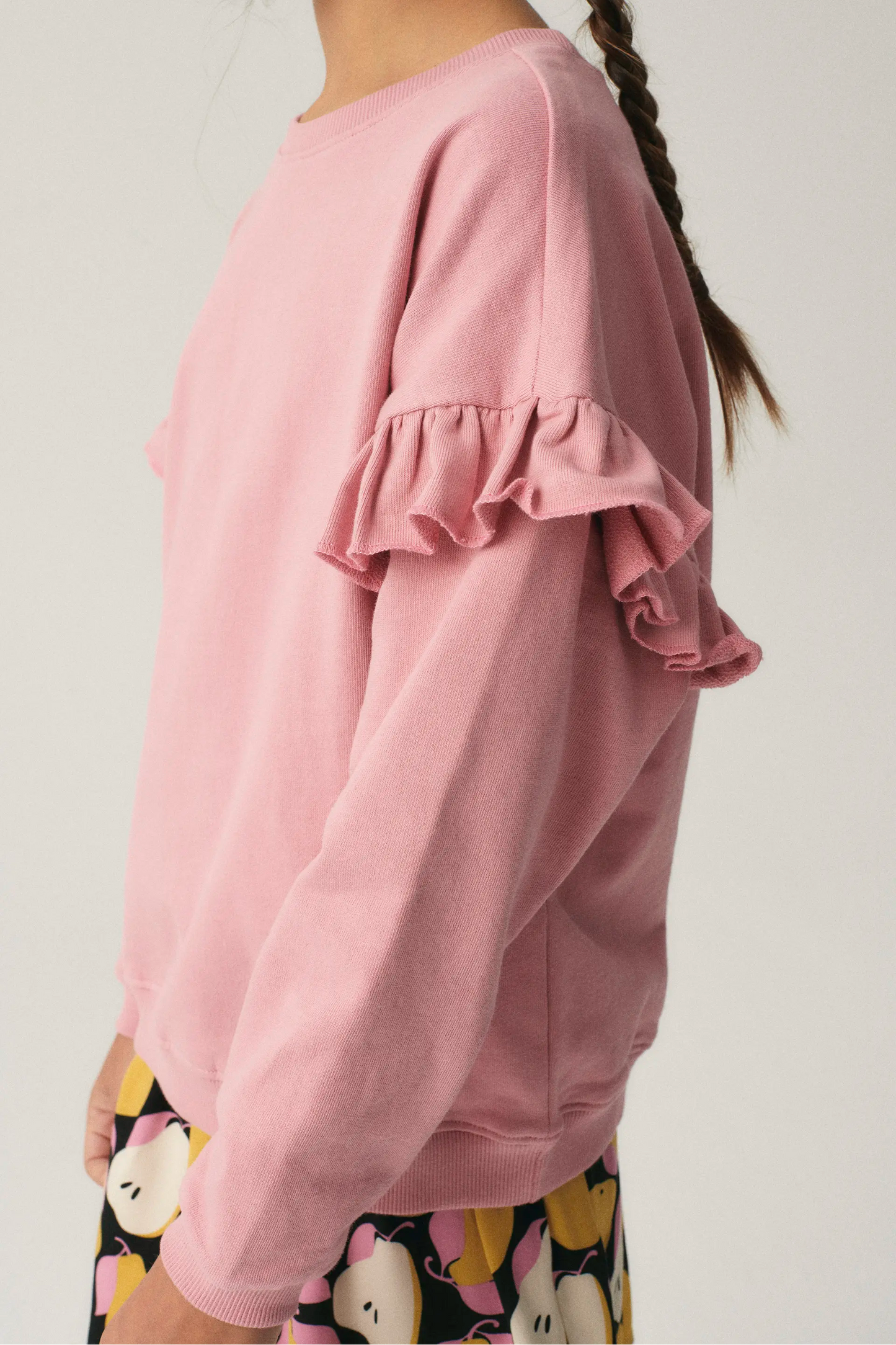 Unisex oversized sweatshirt with pink ruffles