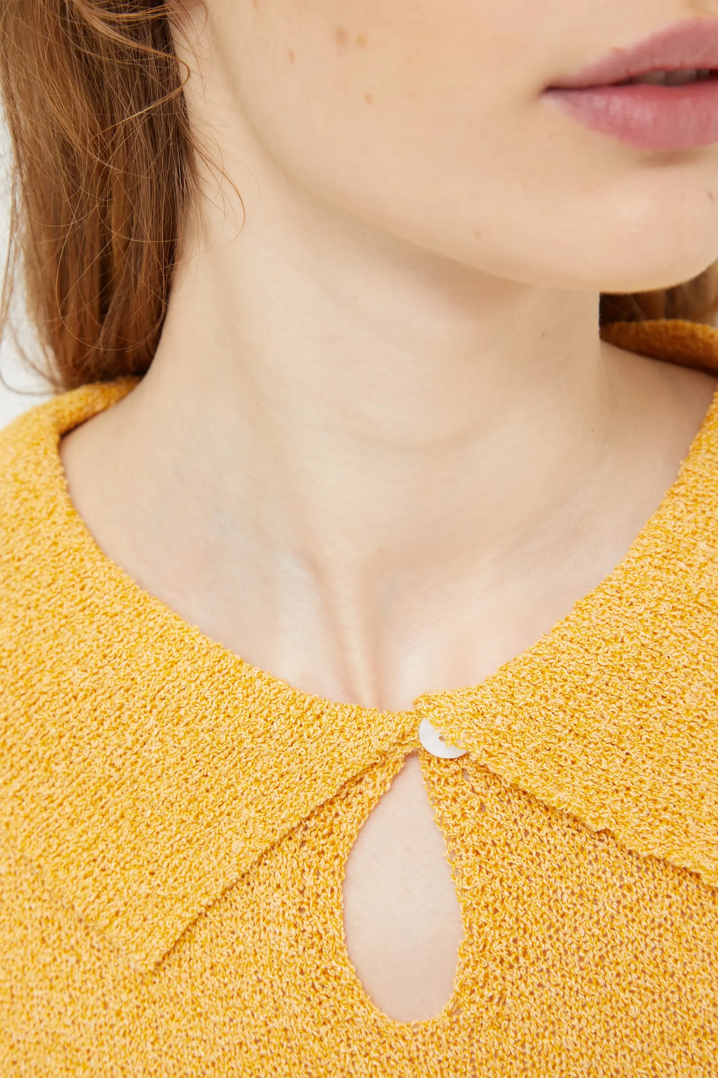 Yellow polo neck sweater
