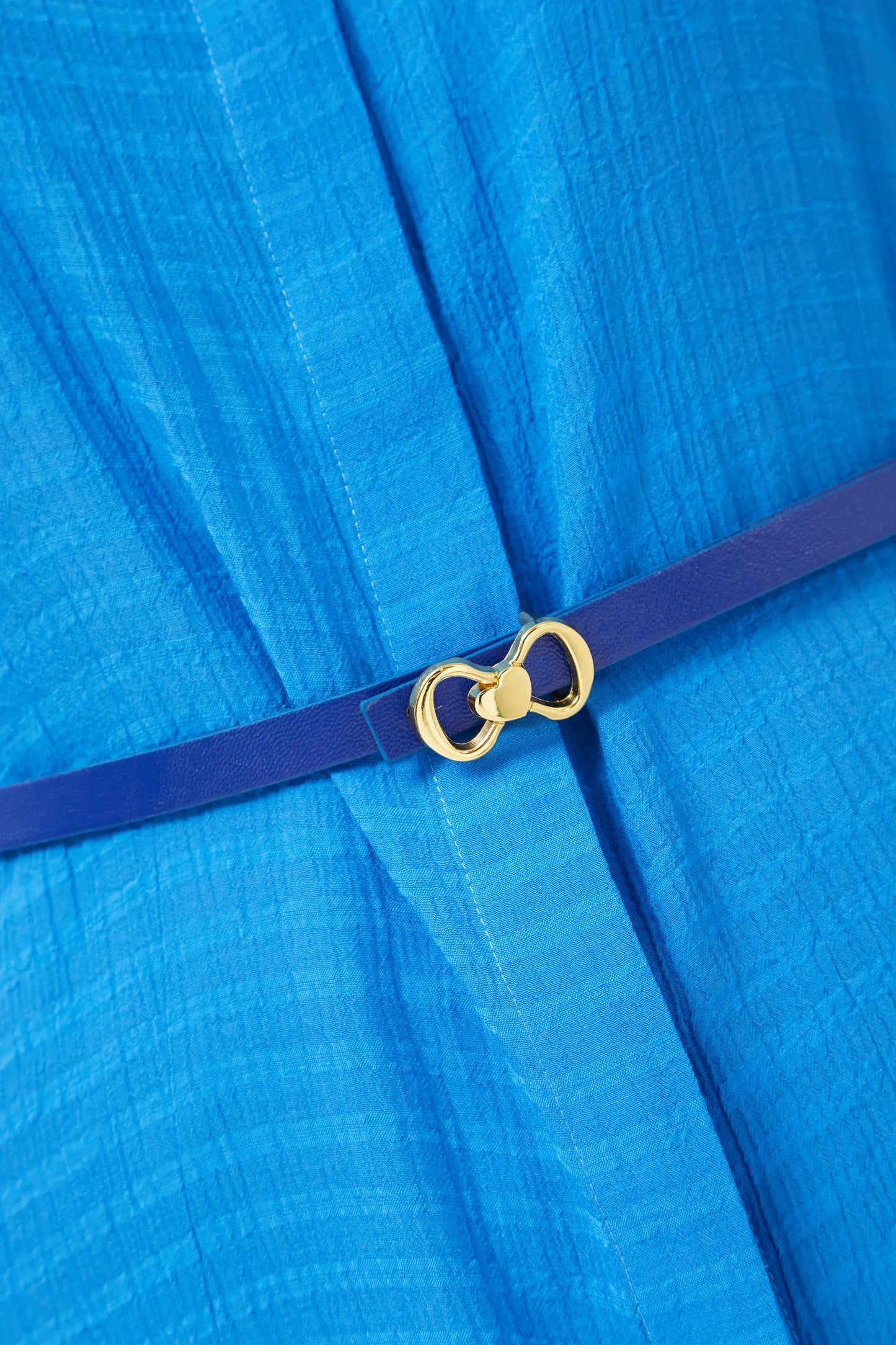 Thin belt with blue heart buckle