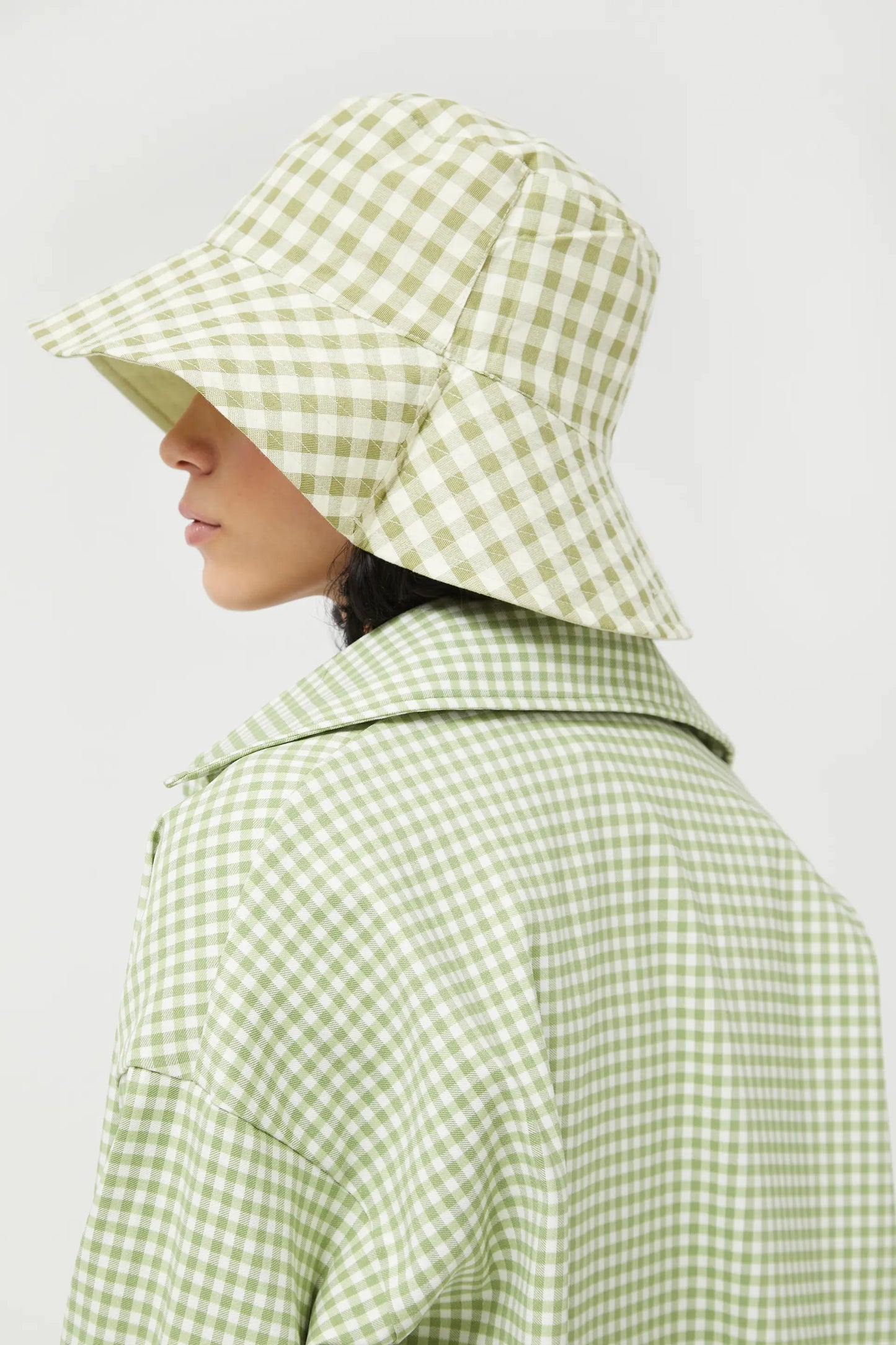 Cappello reversibile a quadretti verdi