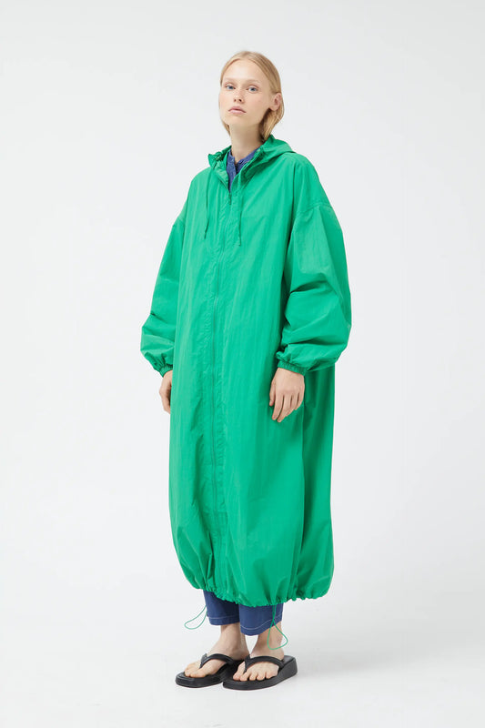 Green technical trench coat