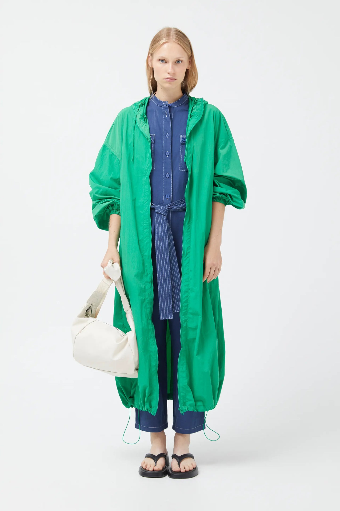Green technical trench coat