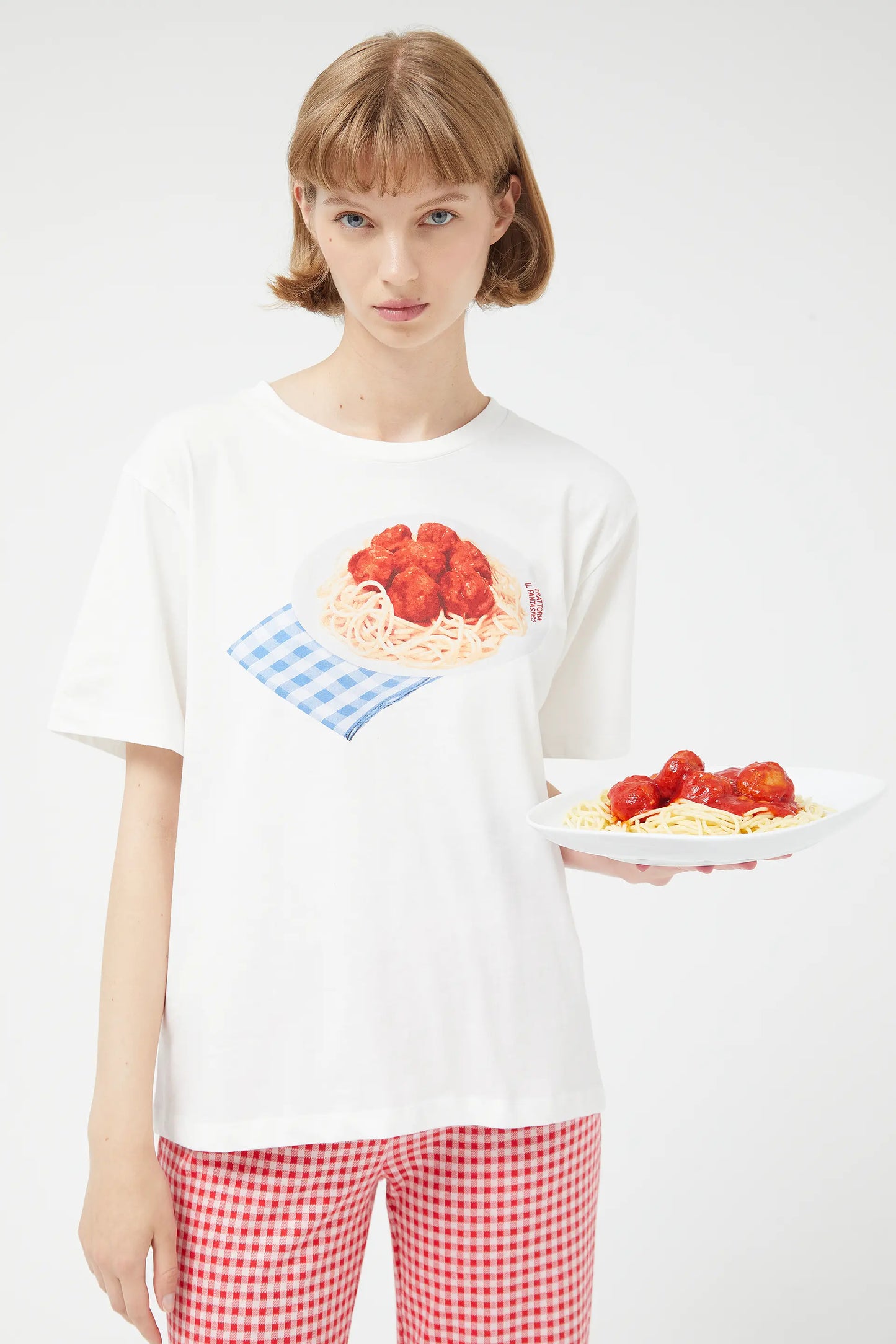 T-shirt bianca a maniche corte con spaghetti