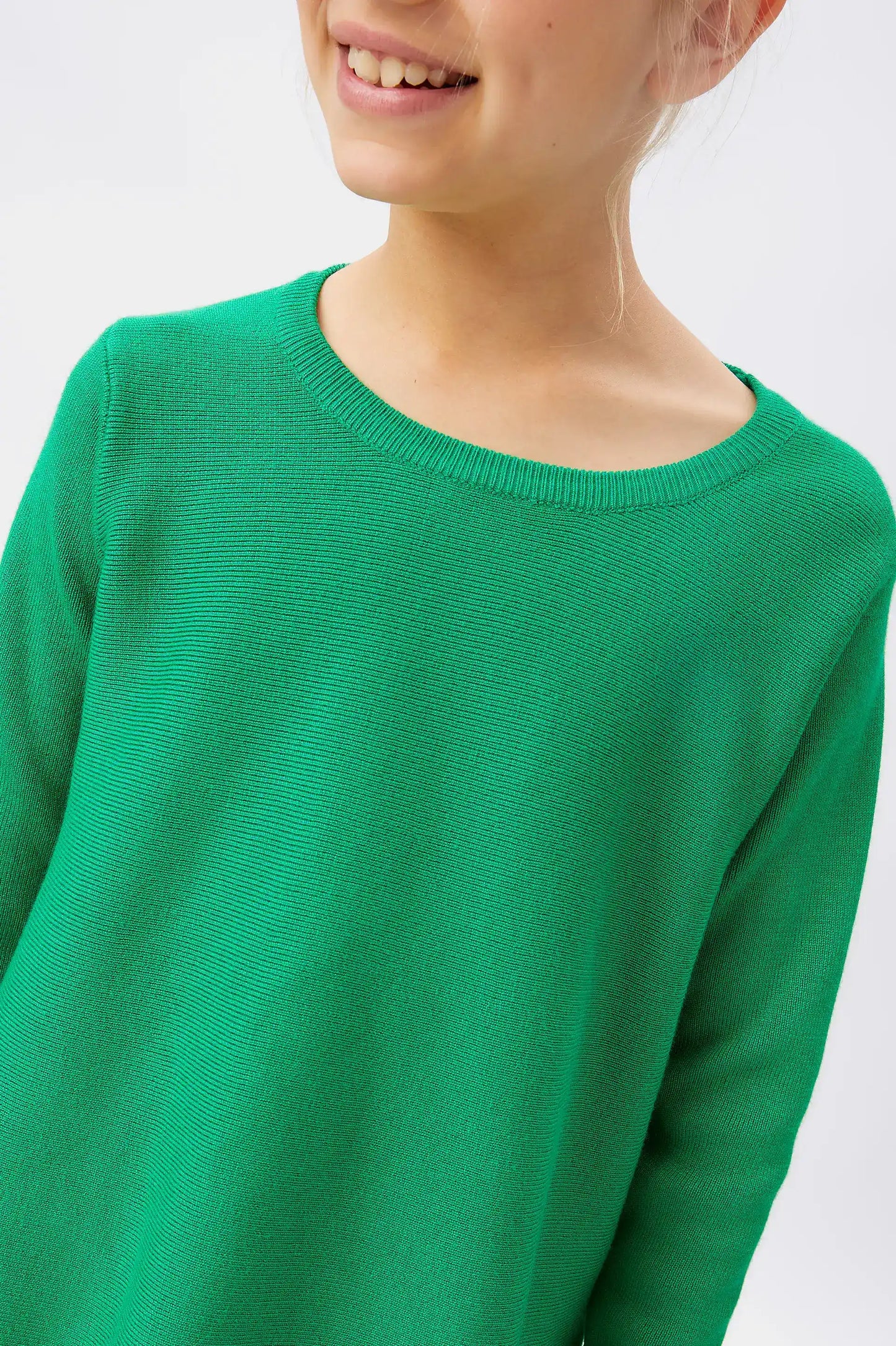 Girl's green flared sweater